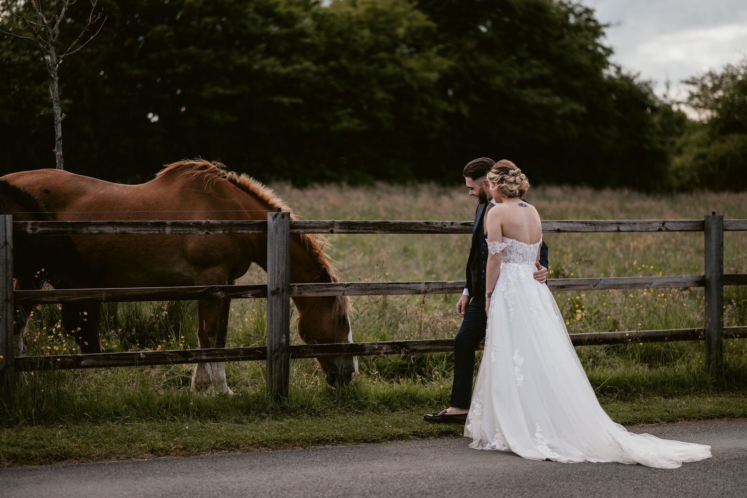 Rustic wedding photography sequence with bride in white dress near wooden fence and horses.