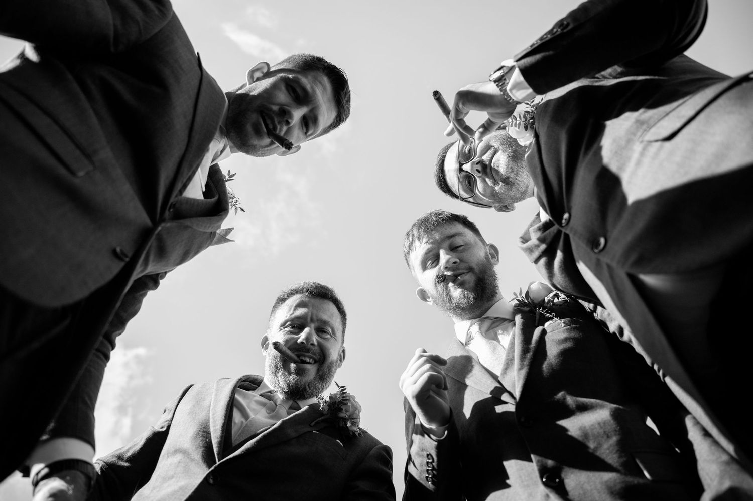 Black and white candid wedding photos showing emotional reactions and laughter during a ceremony.