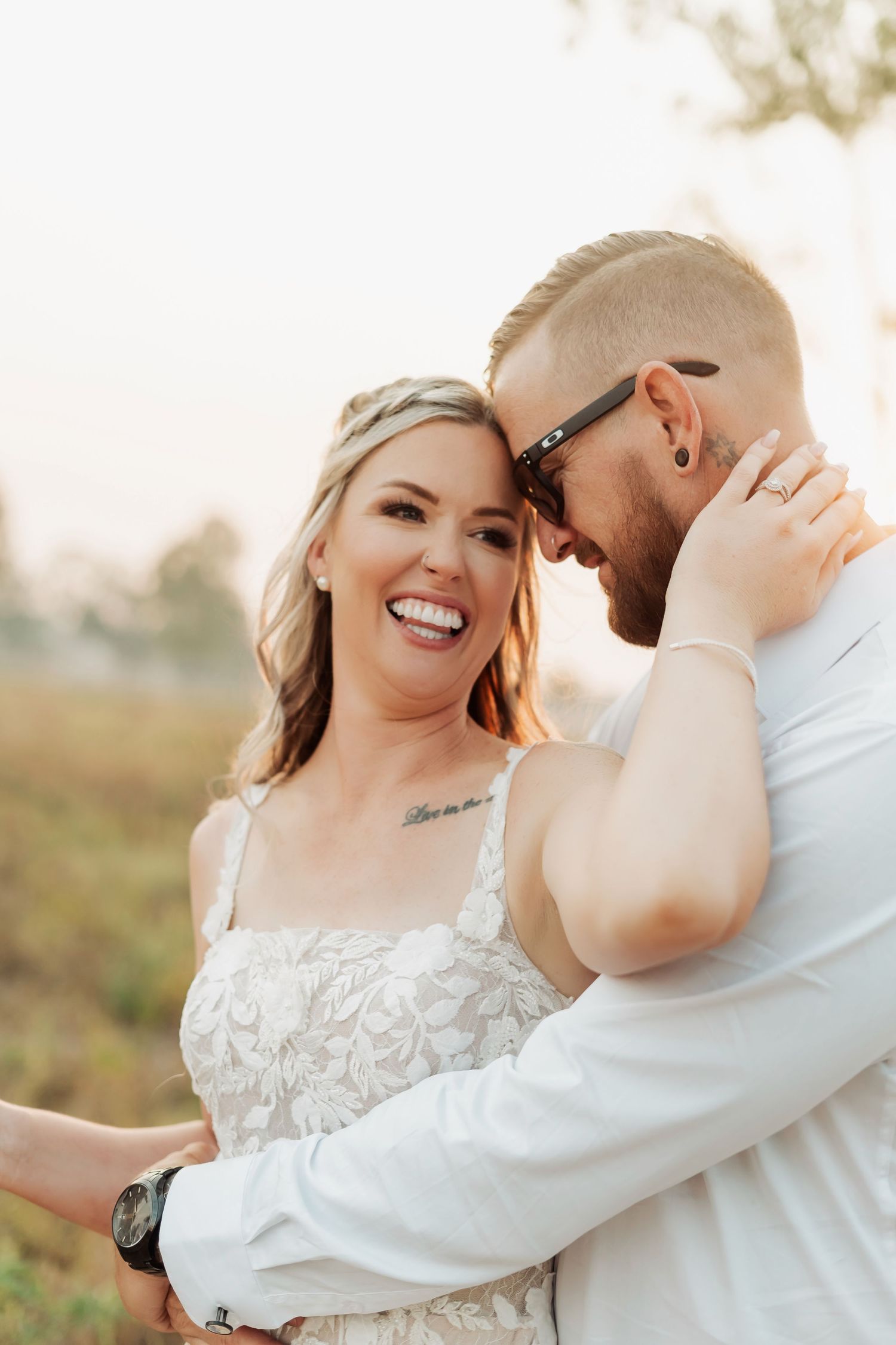 Intimate wedding portraits captured during golden hour showing joyful moments between newlyweds.