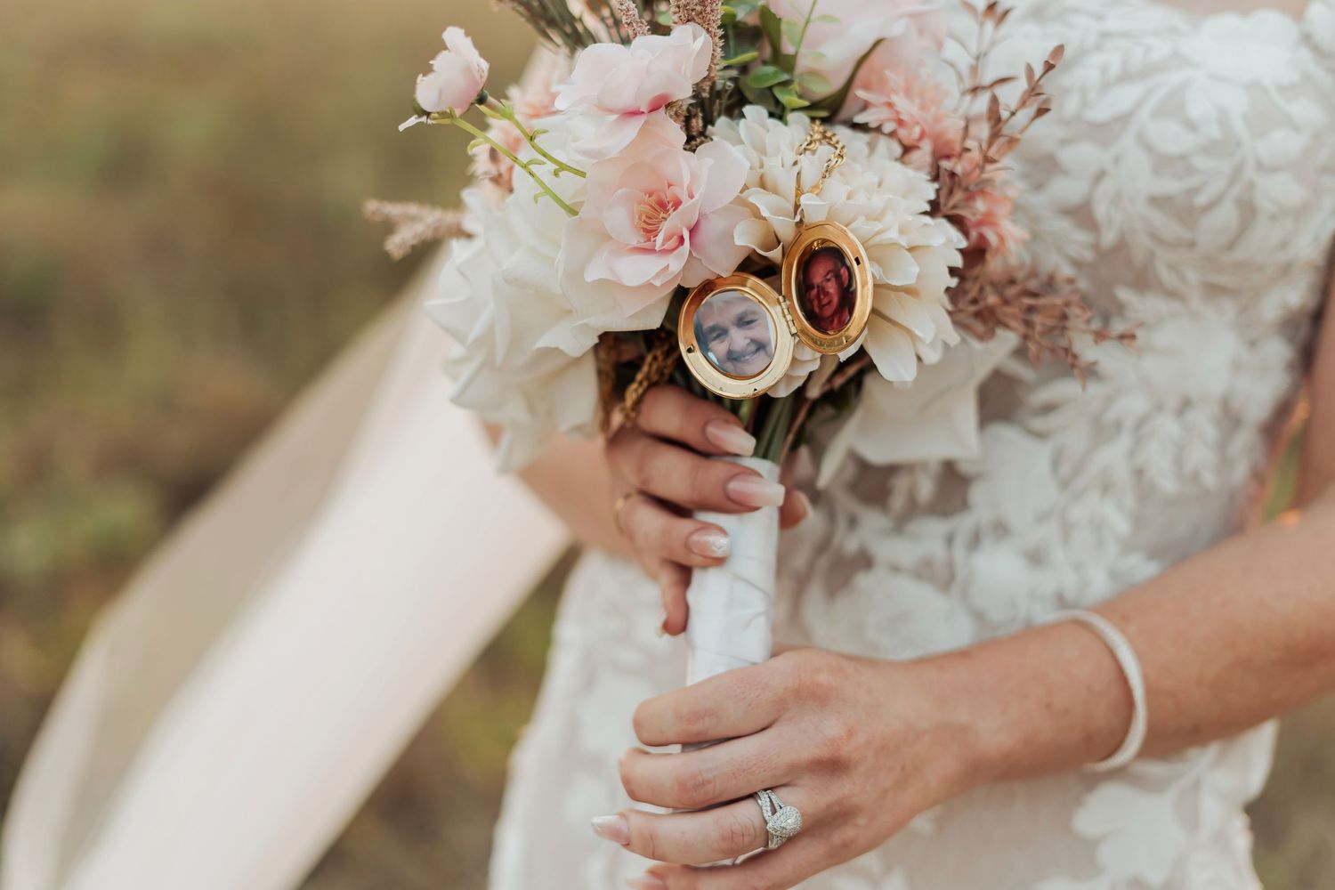 Close-up details of wedding bouquets with pink and white flowers and delicate lace dress details.