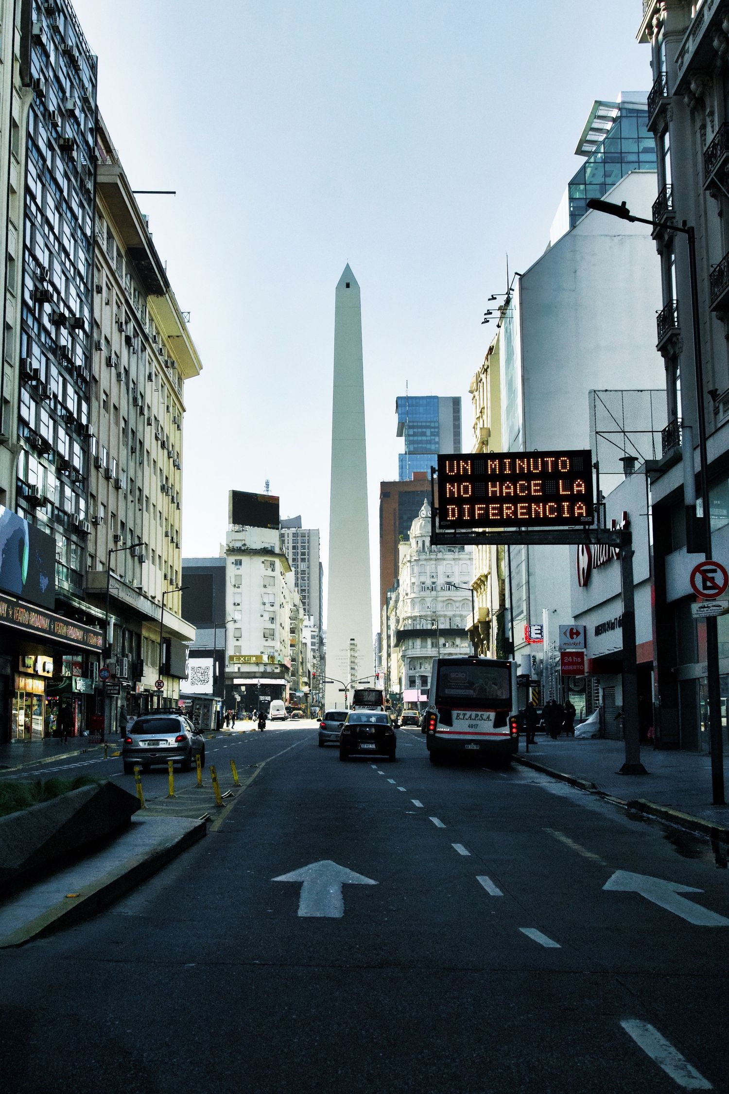 Multiple views of a city street with the Buenos Aires Obelisk visible in the distance.