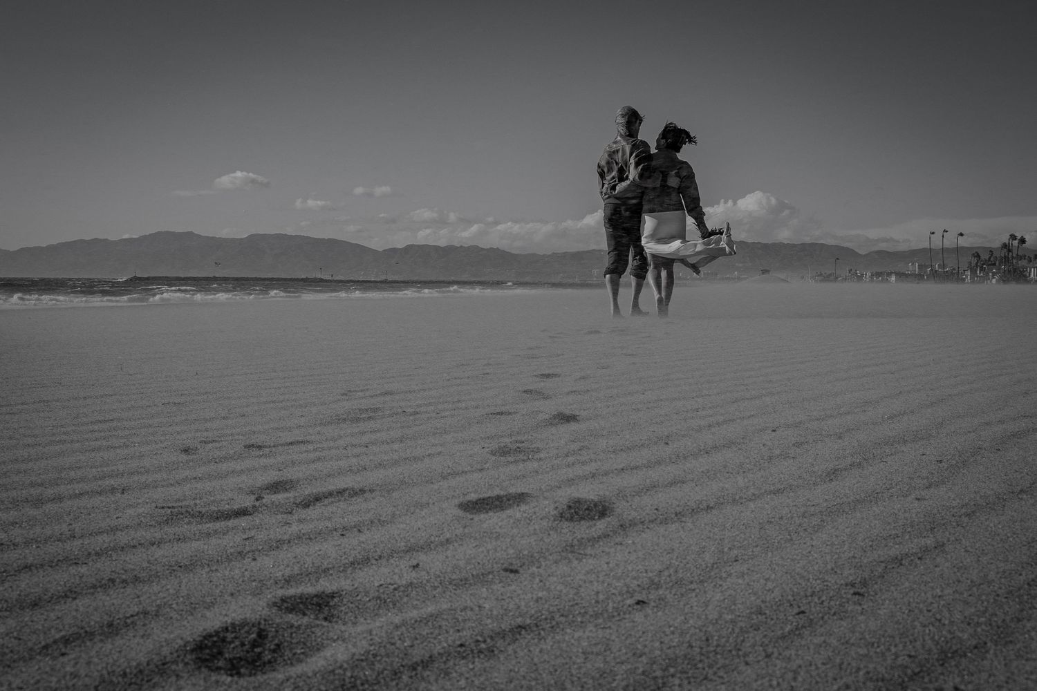 A couple renews their vows on the beach in Playa del Rey, Los Angeles, California.