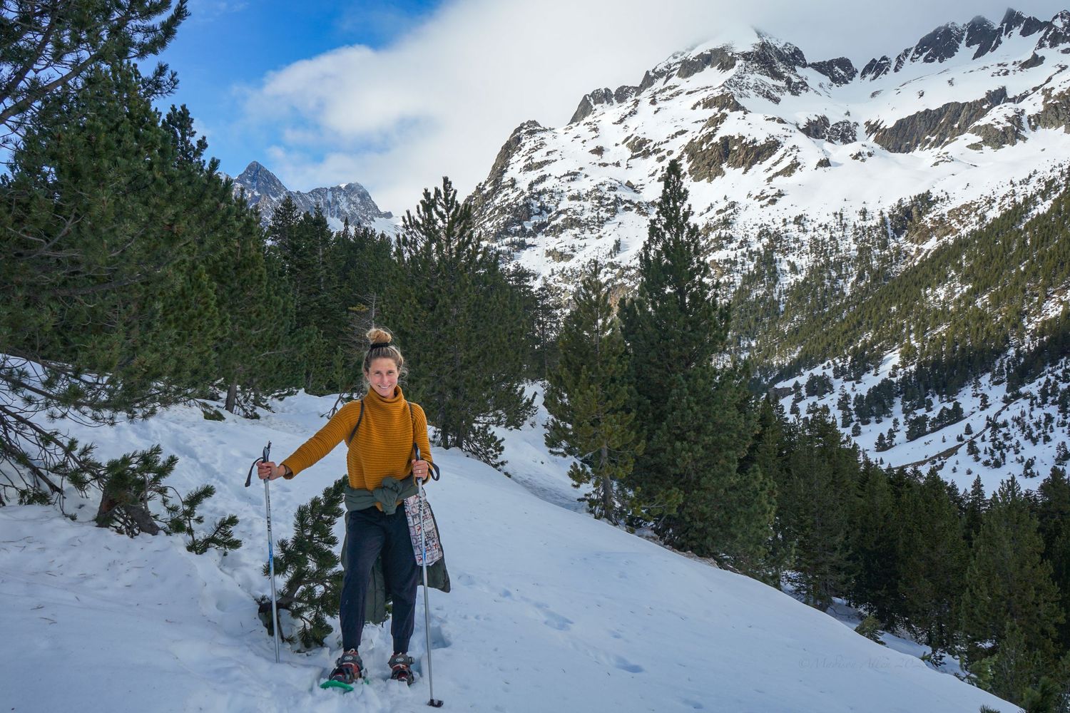 Madison, the photographer from Mad Elopements snowshoes through the Pyrenees mountains in Andorra.