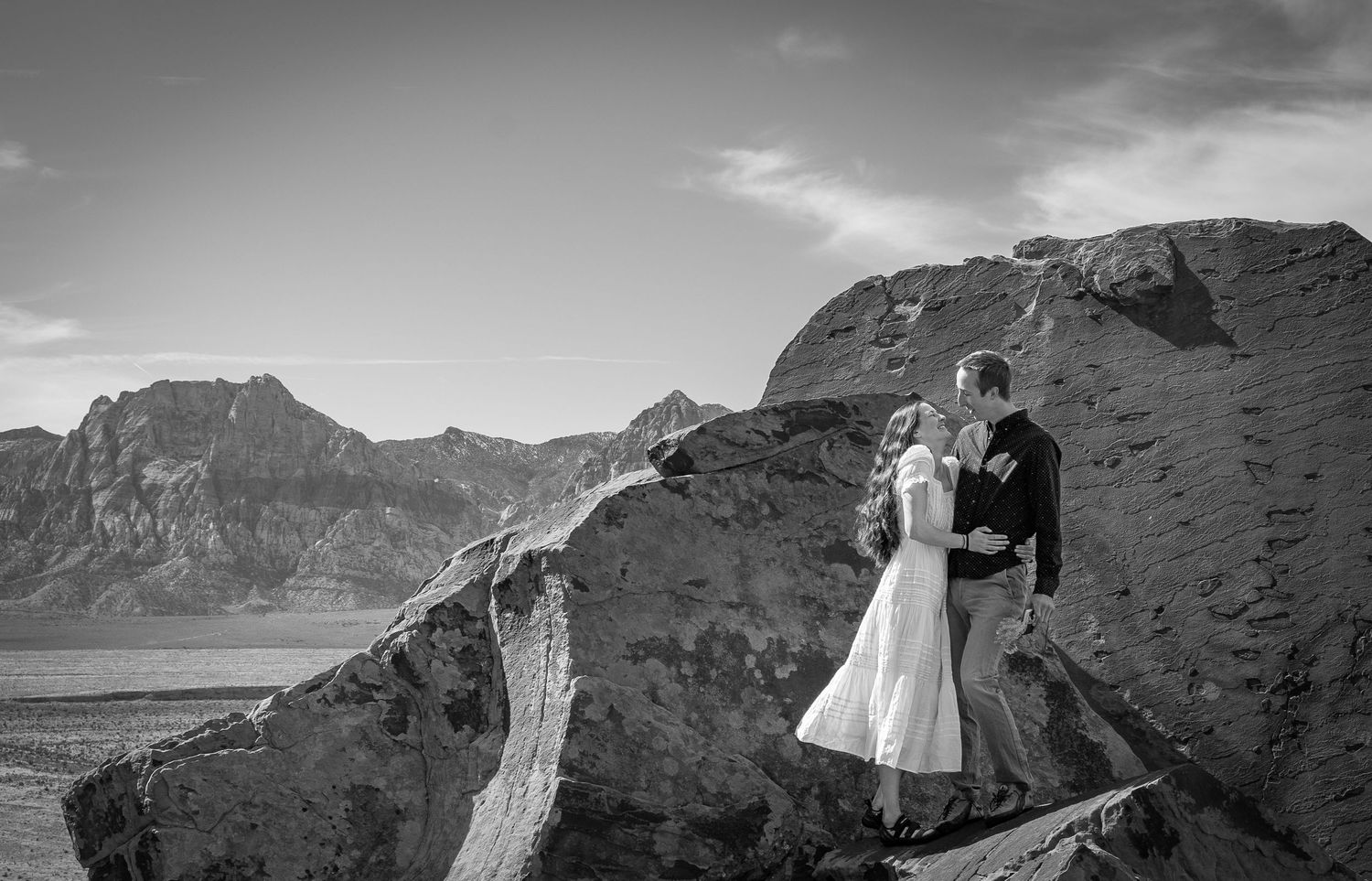 A couple in love on the rocks in Red Rocks, Nevada.