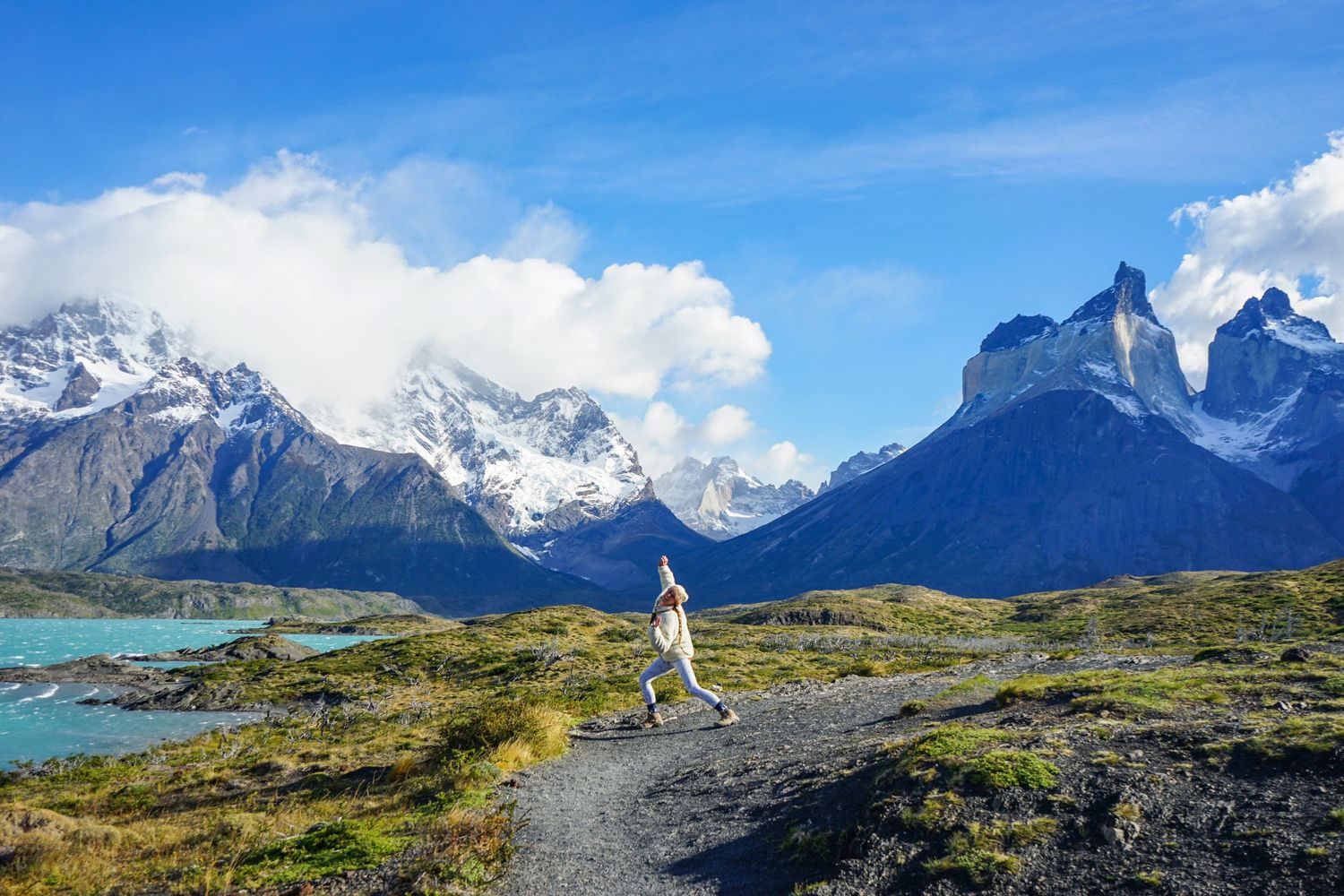 Adventure hiking elopement in Patagonia. Girl dancing surrounded by mountains and glaciers