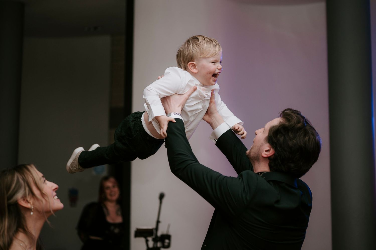 Sweet moments of celebration and dancing captured during a wedding reception.