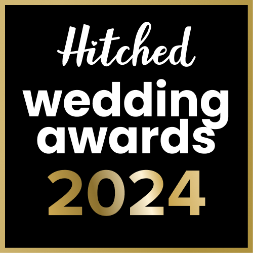 Hitched Wedding Awards 2024 logo in white and gold text against a black background with gold border.
