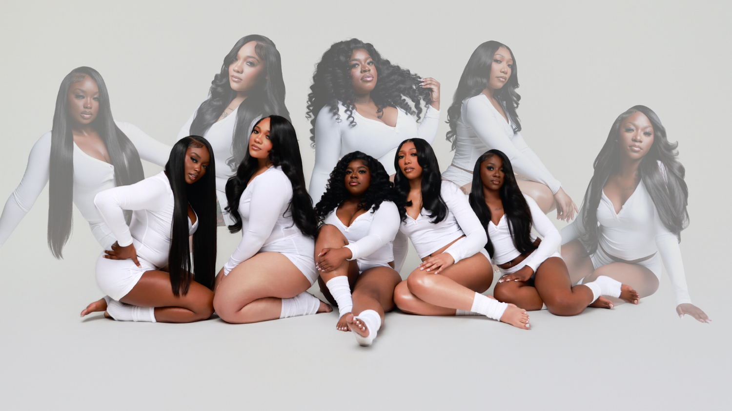 Group of Black women in matching white outfits pose together in a composite studio photo.