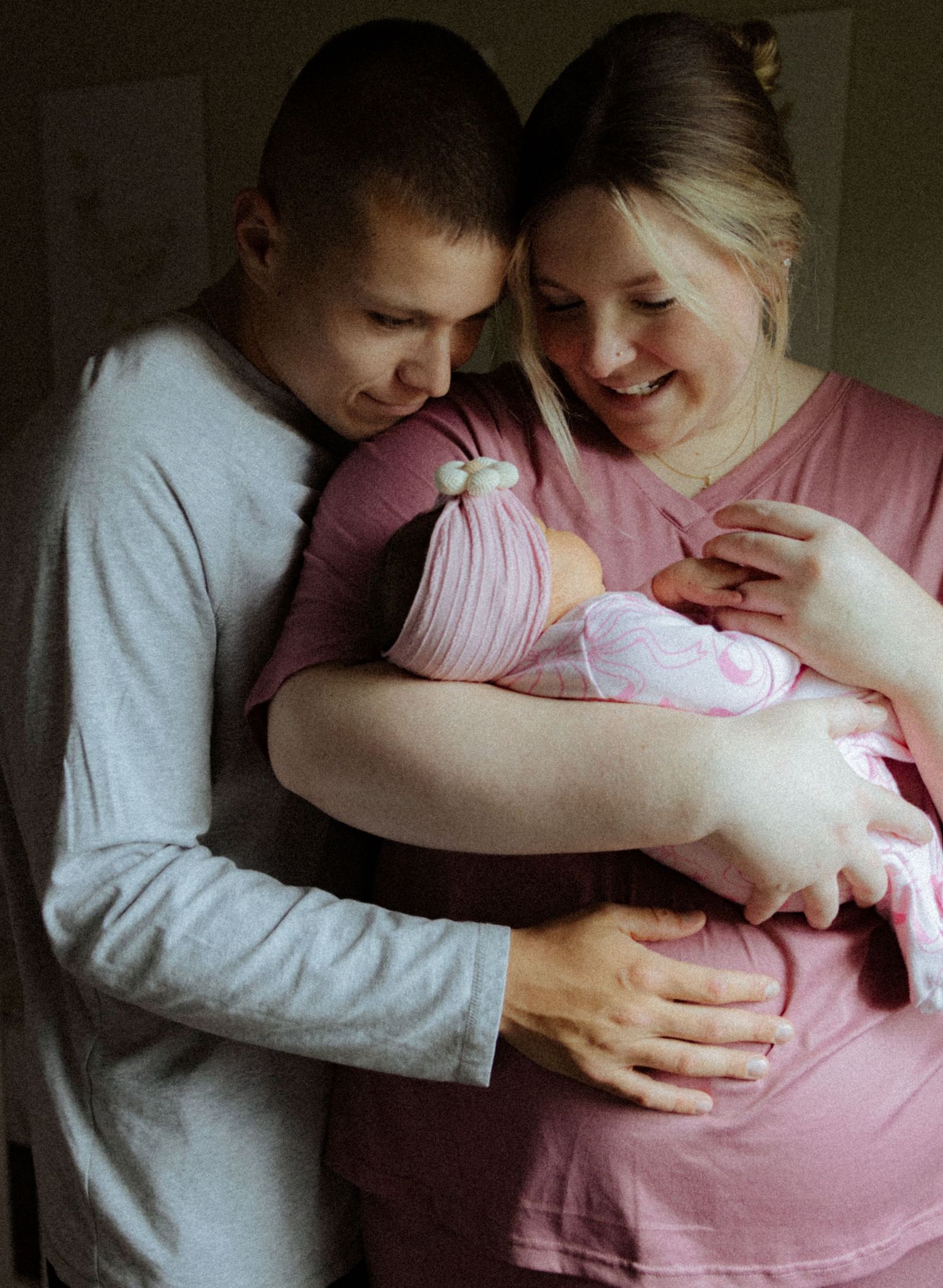 newborn baby with parents