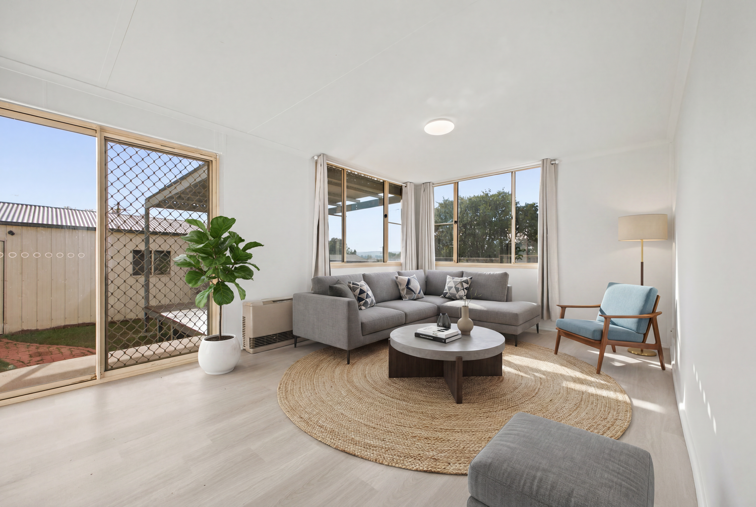 Image featuring virtual furniture in an unfurnished home.