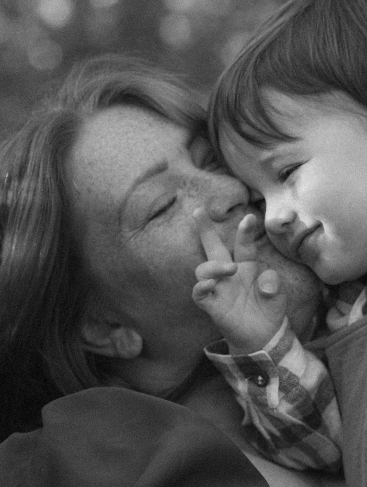 Family portraits in Regina, Saskatchewan capturing authentic connection between parents and their children.