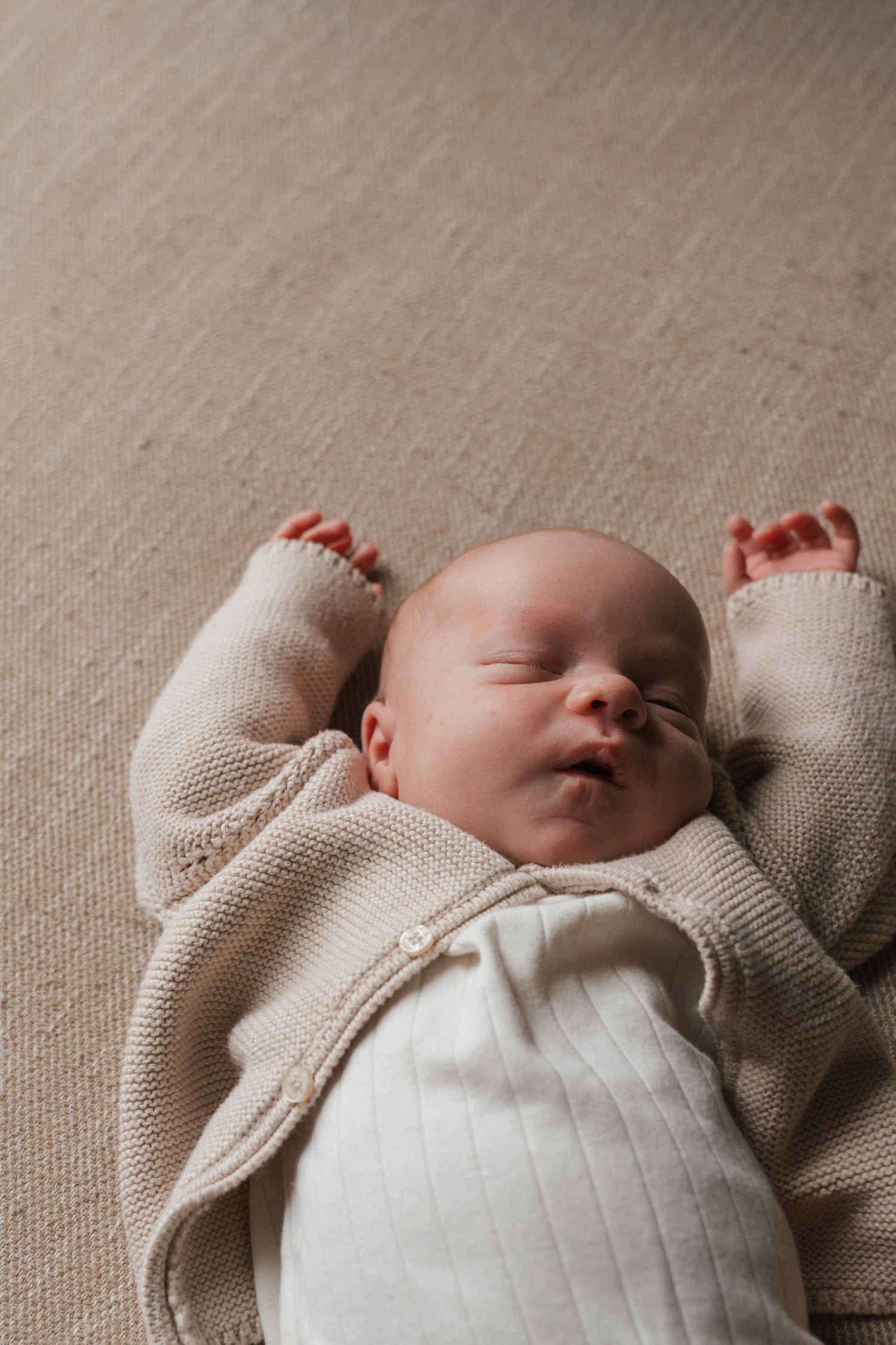 Lifestyle newborn photography in Regina, Saskatchewan capturing natural newborn moments with families throughout Saskatchewan.