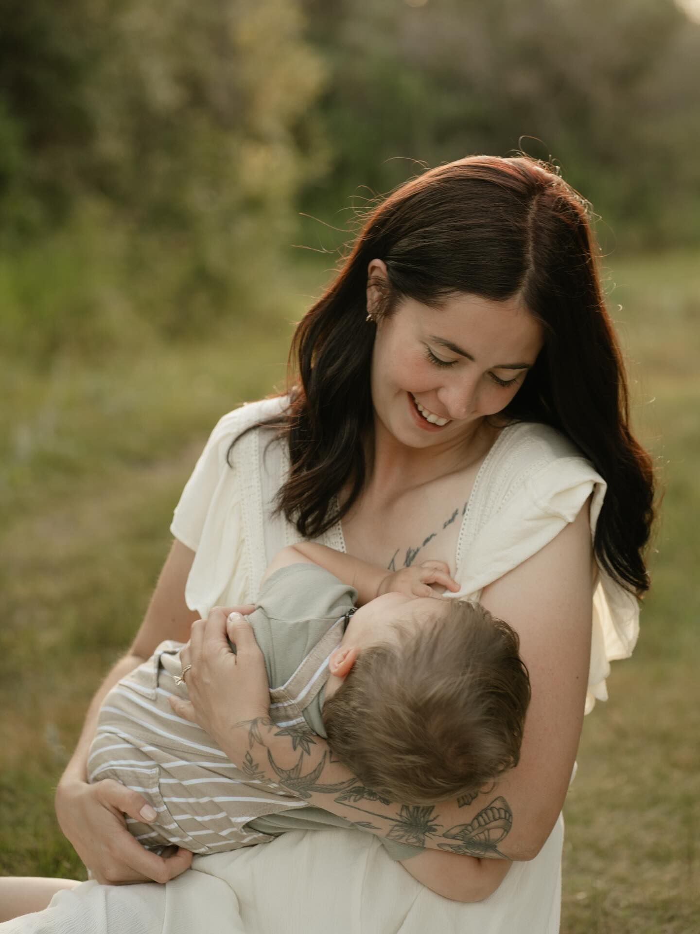 Signature motherhood portraits in Regina, Saskatchewan capturing authentic connection between mothers and their children.