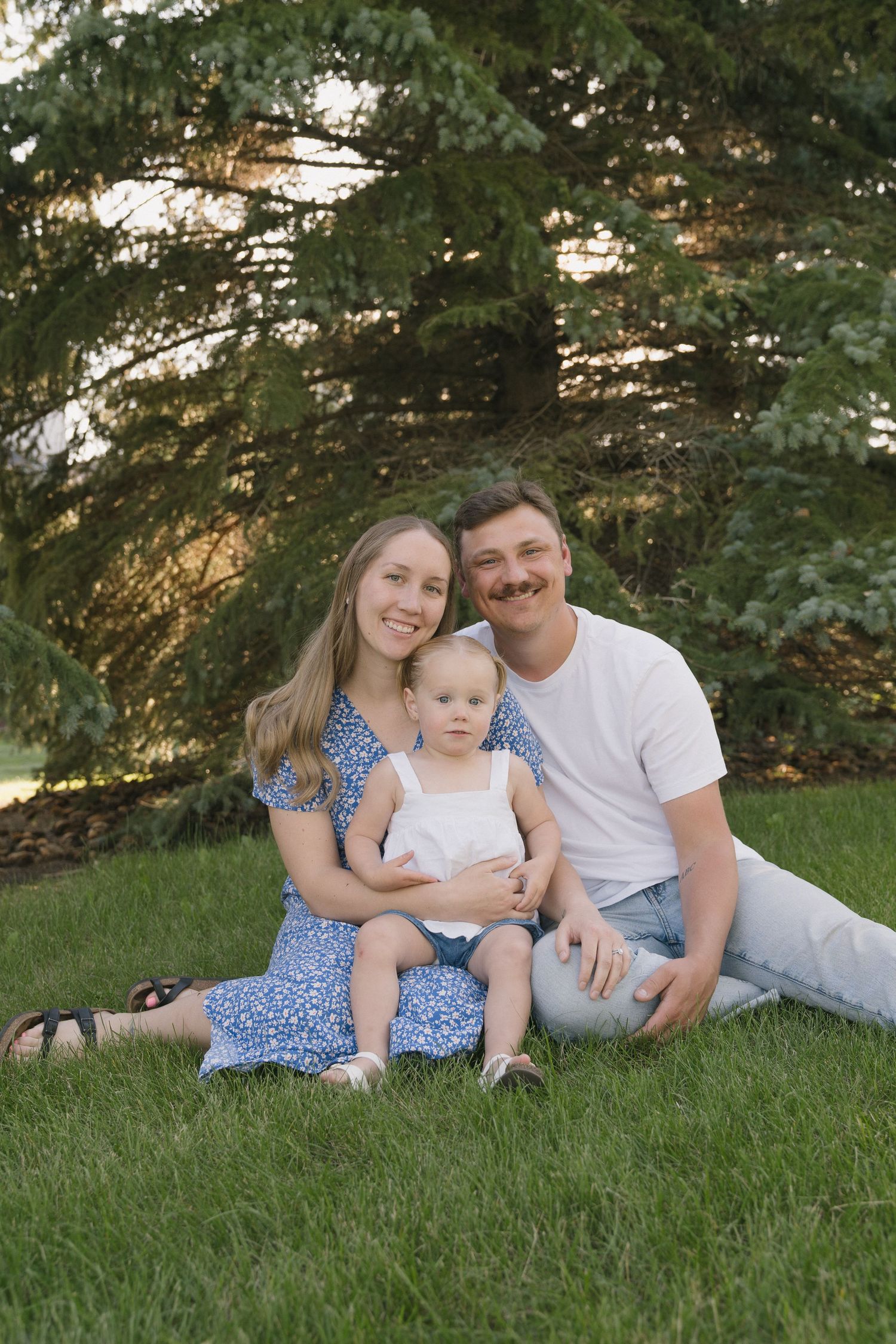 Family portraits in Regina, Saskatchewan capturing authentic connection between parents and their children.