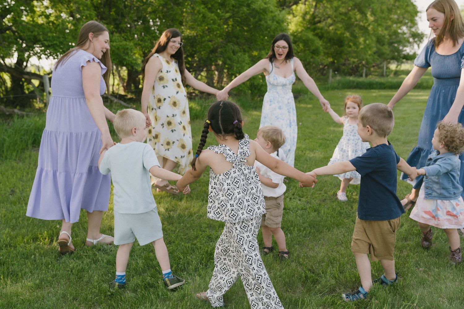 Signature motherhood portraits in Regina, Saskatchewan capturing authentic connection between mothers and their children.