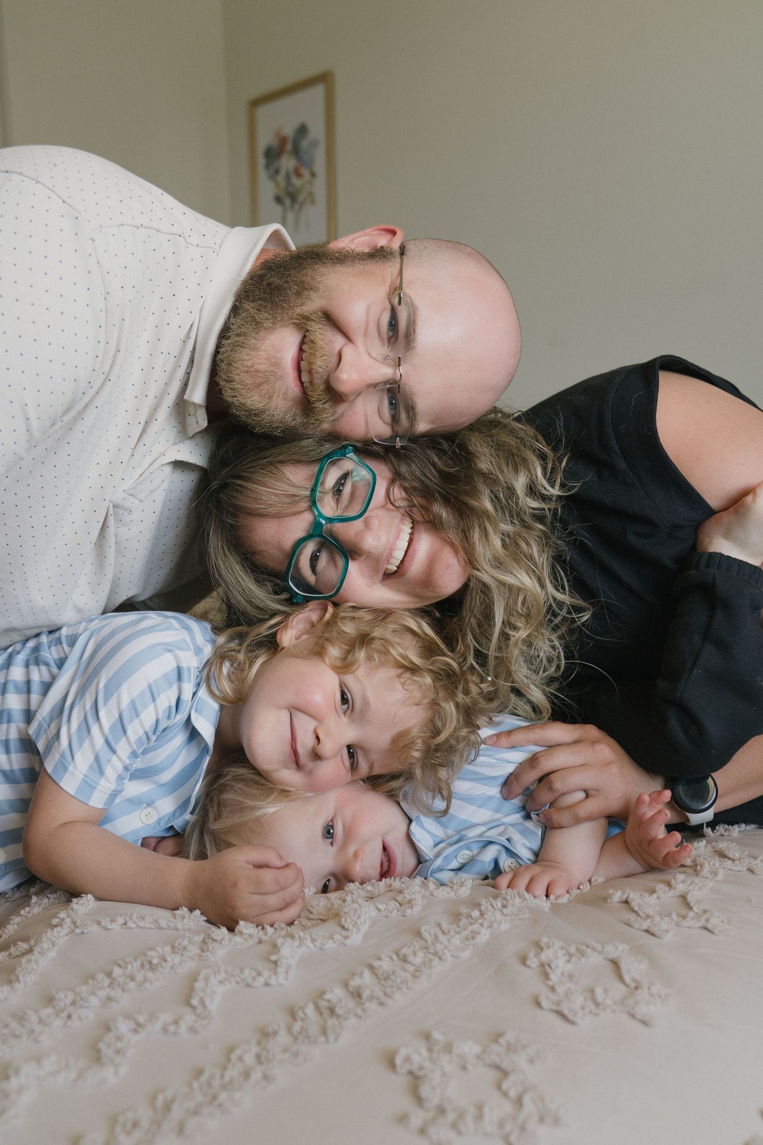 Family portraits in Regina, Saskatchewan capturing authentic connection between parents and their children.