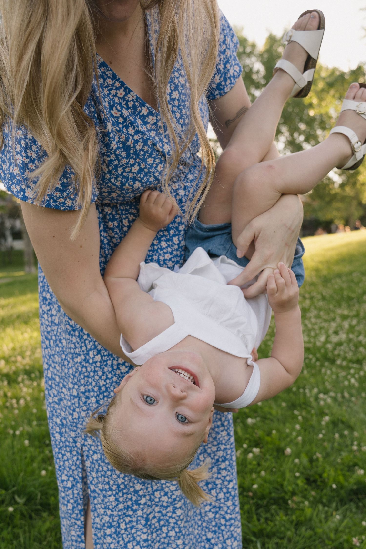 Motherhood portraits in Regina, Saskatchewan capturing authentic connection between mothers and their children.