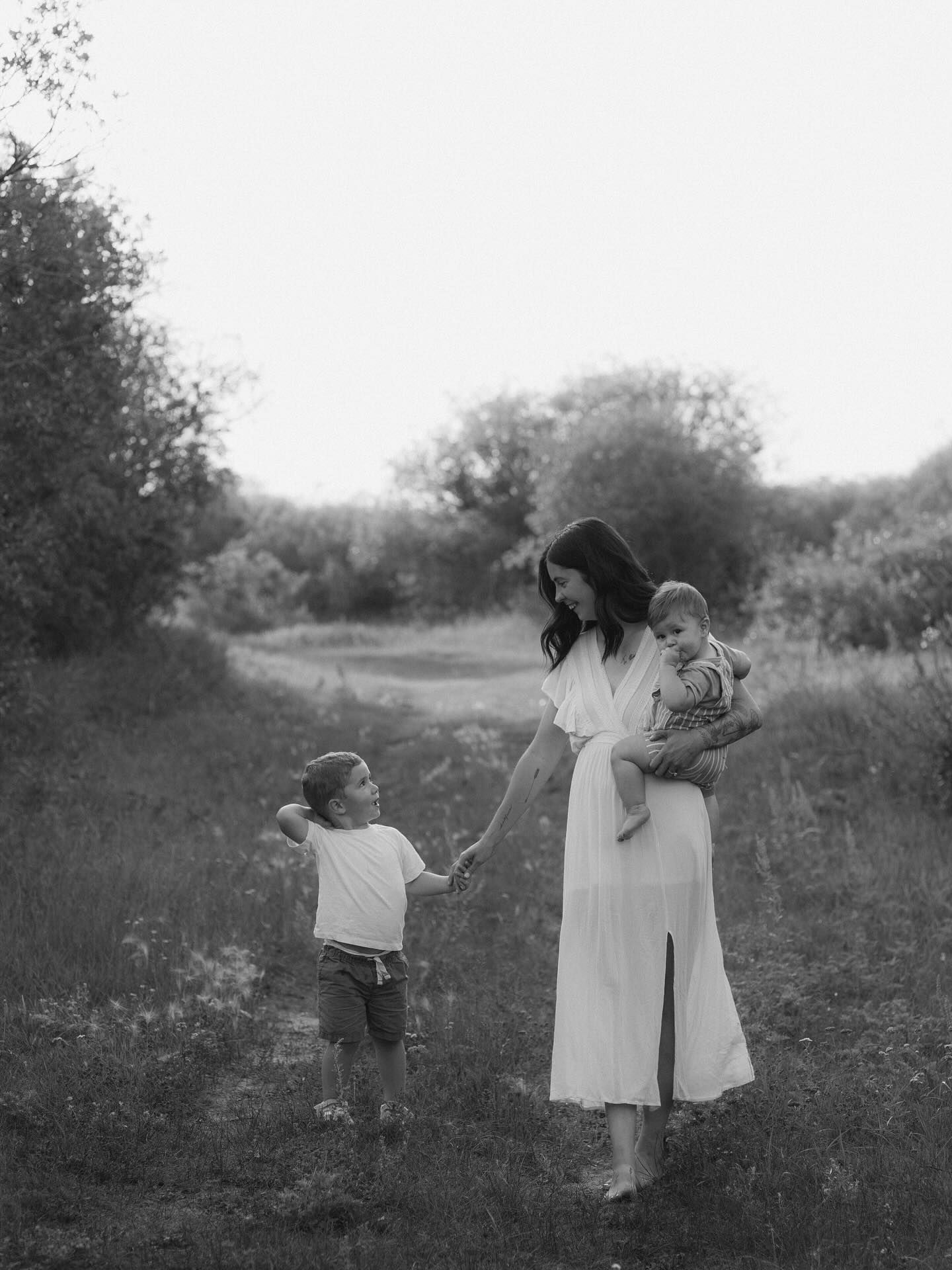 Signature motherhood portraits in Regina, Saskatchewan capturing authentic connection between mothers and their children.