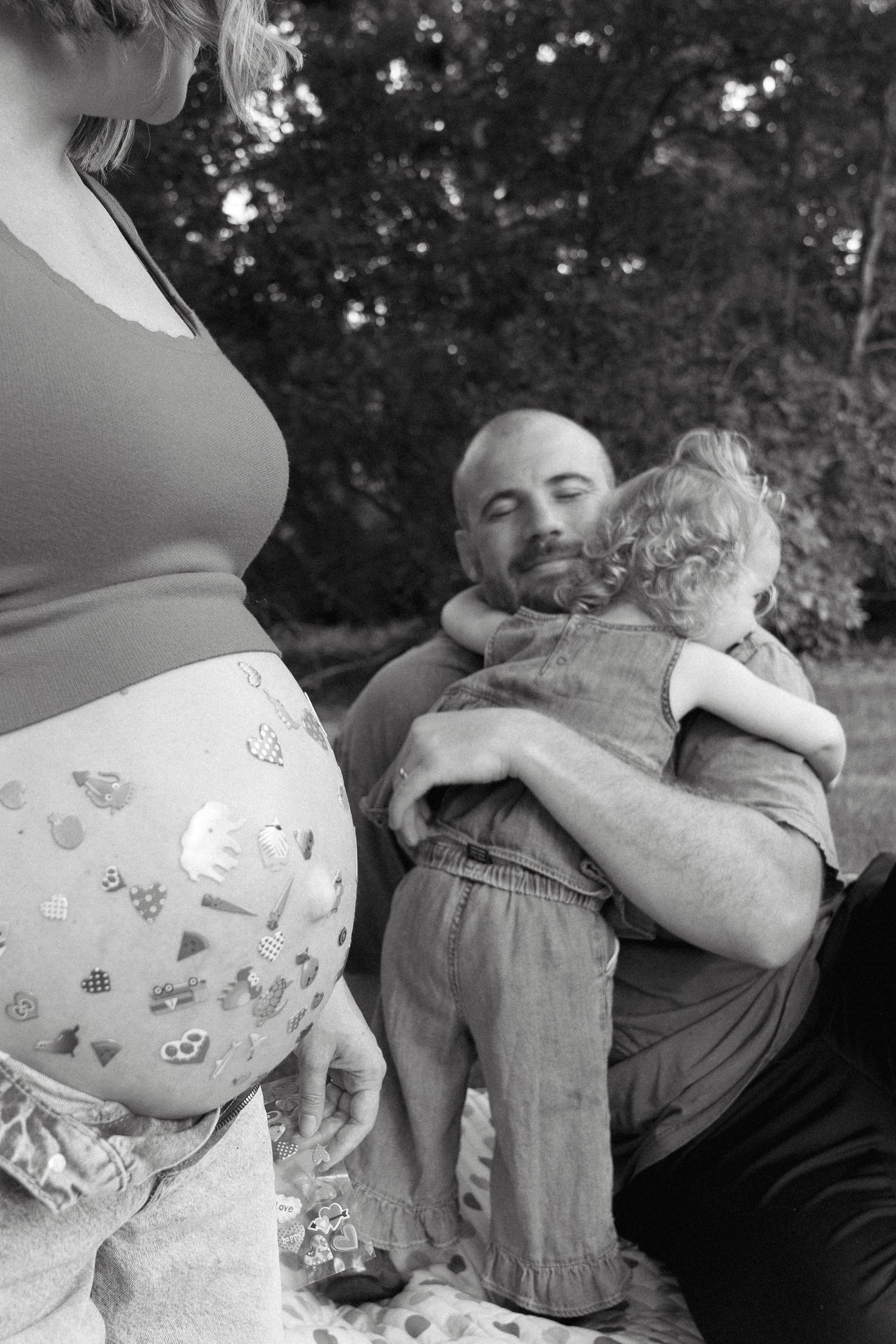 Family portraits in Regina, Saskatchewan capturing authentic connection between parents and their children.