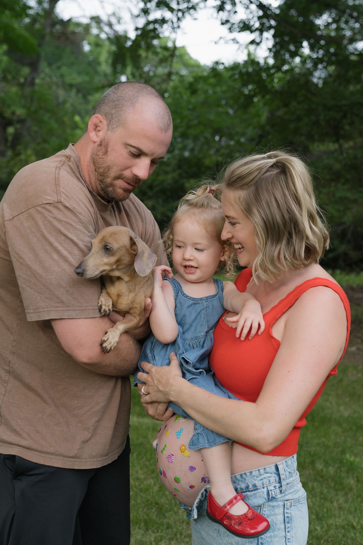 Family portraits in Regina, Saskatchewan capturing authentic connection between parents and their children.