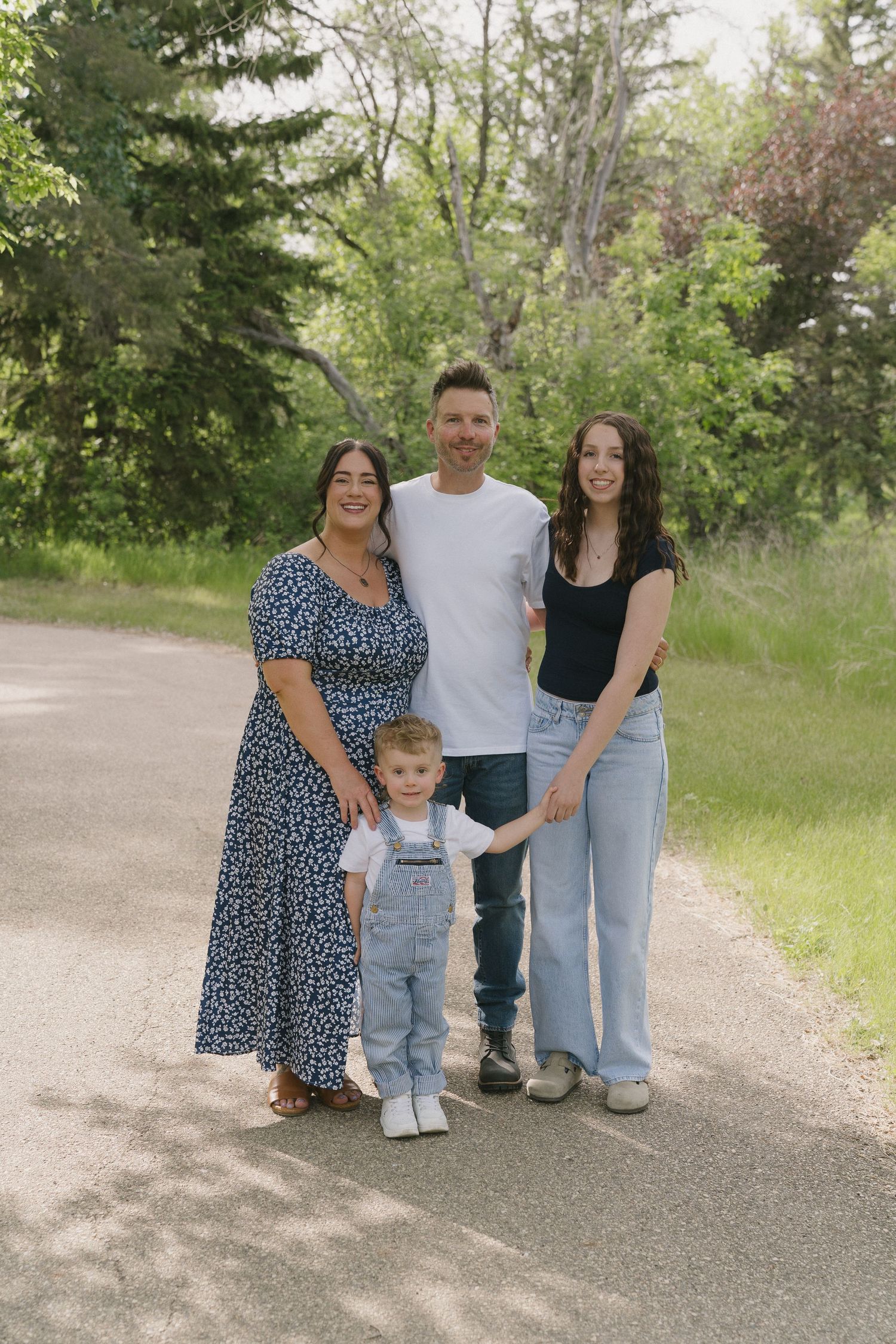 Family portraits in Regina, Saskatchewan capturing authentic connection between parents and their children.