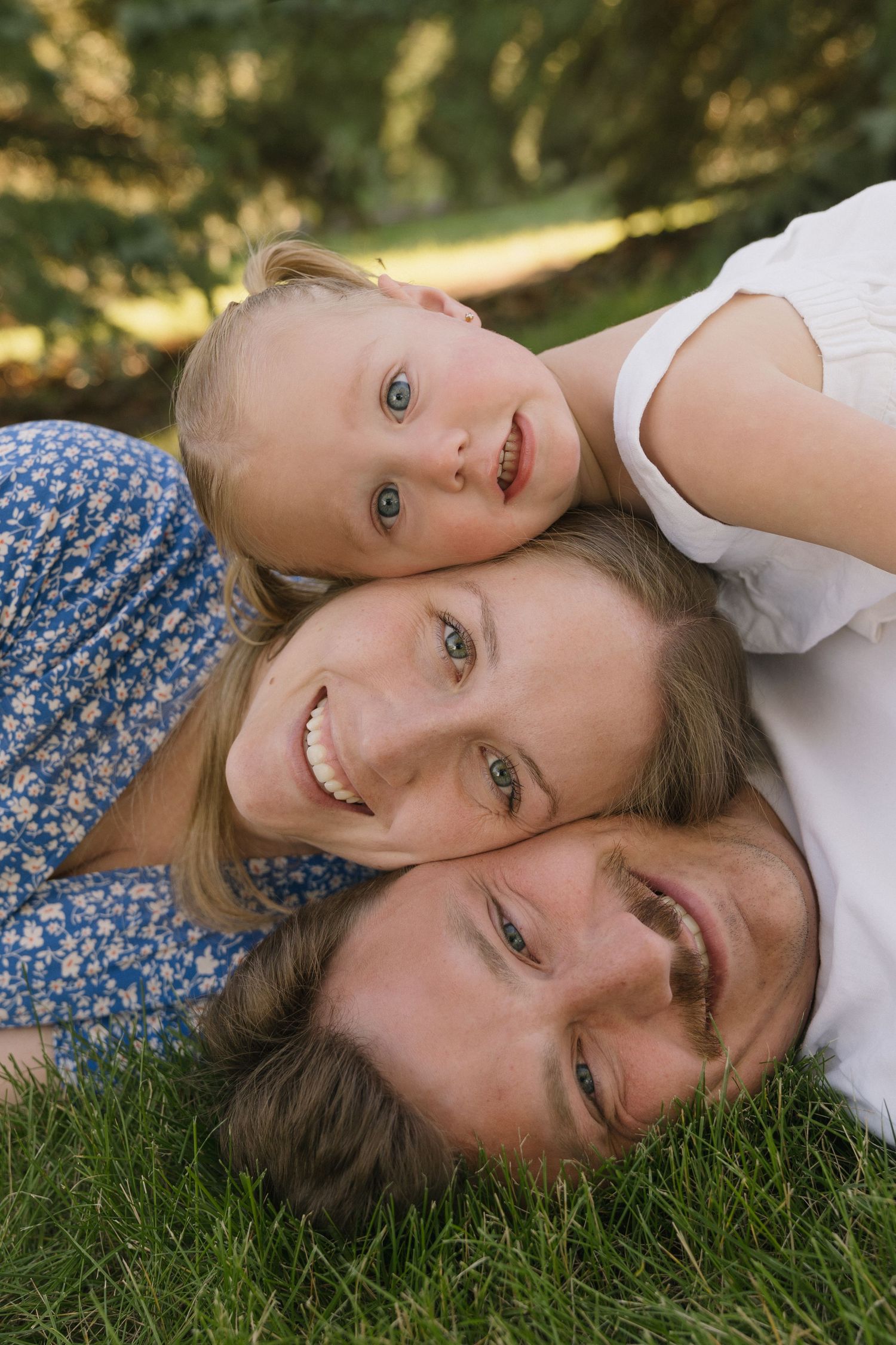 Family portraits in Regina, Saskatchewan capturing authentic connection between parents and their children.