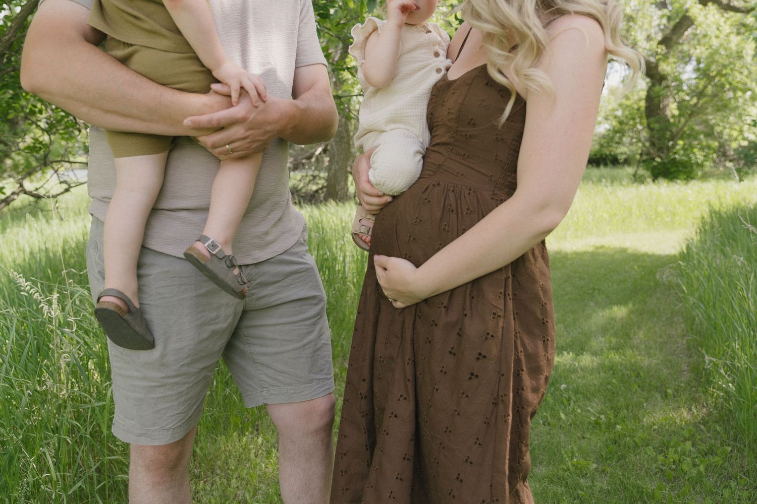 Family portraits in Regina, Saskatchewan capturing authentic connection between parents and their children.