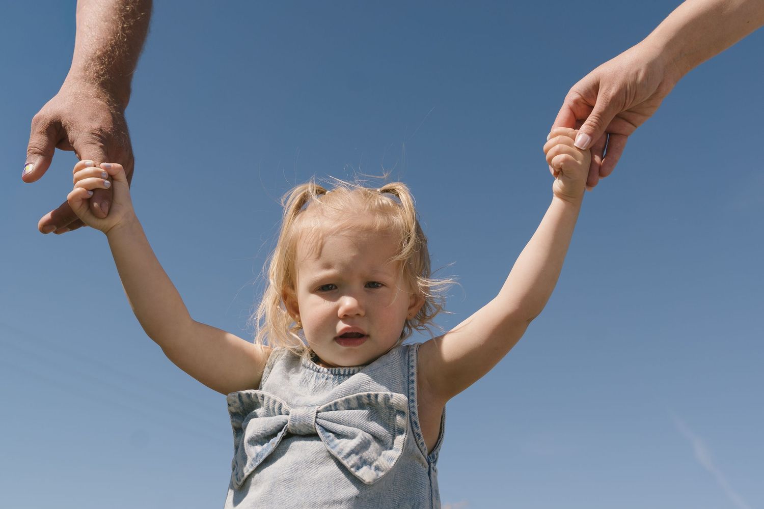 Family portraits in Regina, Saskatchewan capturing authentic connection between parents and their children.