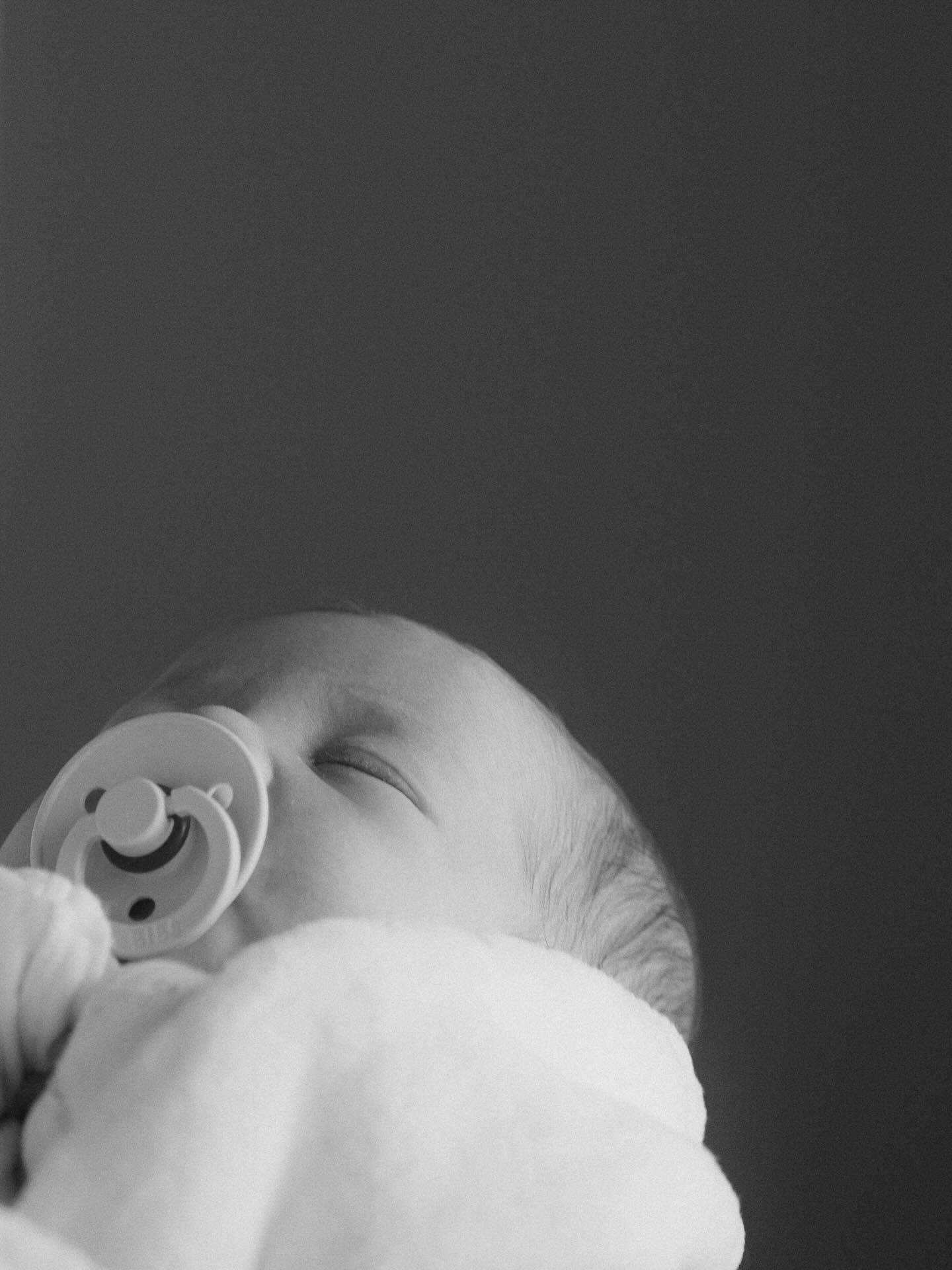 Lifestyle newborn photography in Regina, Saskatchewan capturing natural newborn moments with families throughout Saskatchewan.