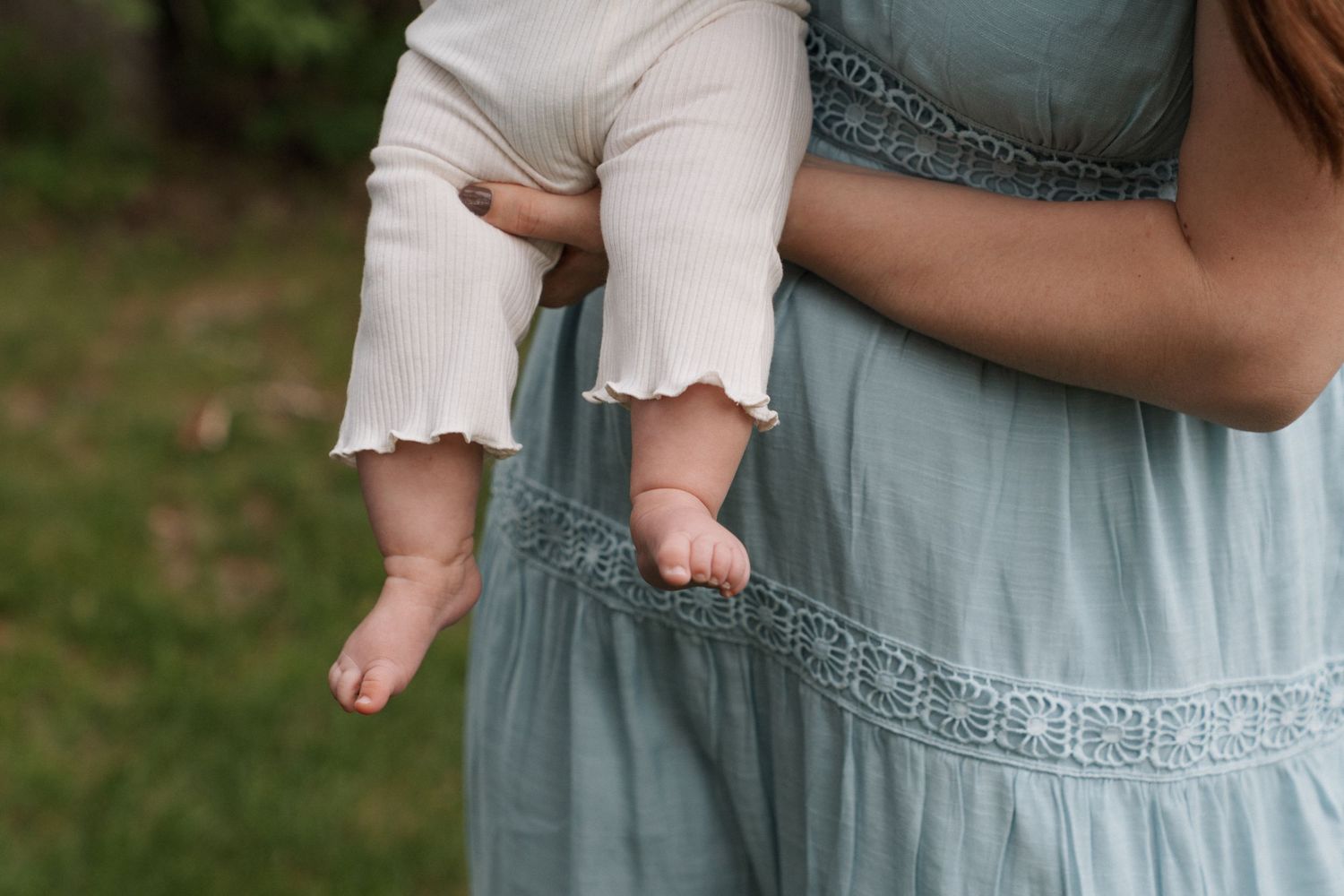 Lifestyle newborn photography in Regina, Saskatchewan capturing natural newborn moments with families throughout Saskatchewan.