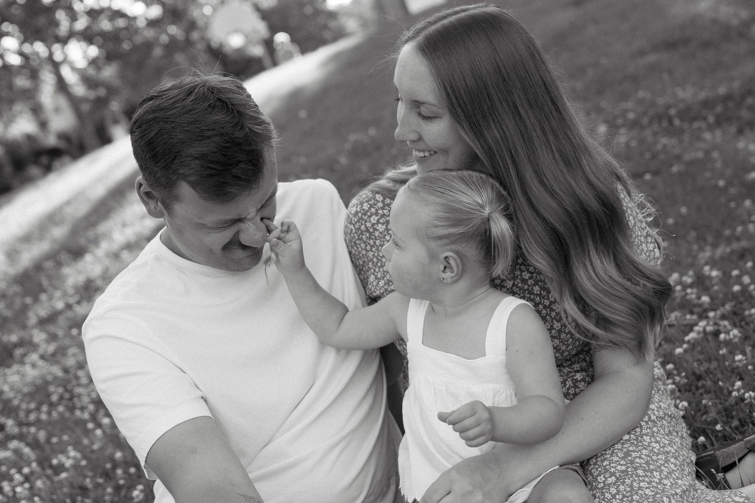 Family portraits in Regina, Saskatchewan capturing authentic connection between parents and their children.