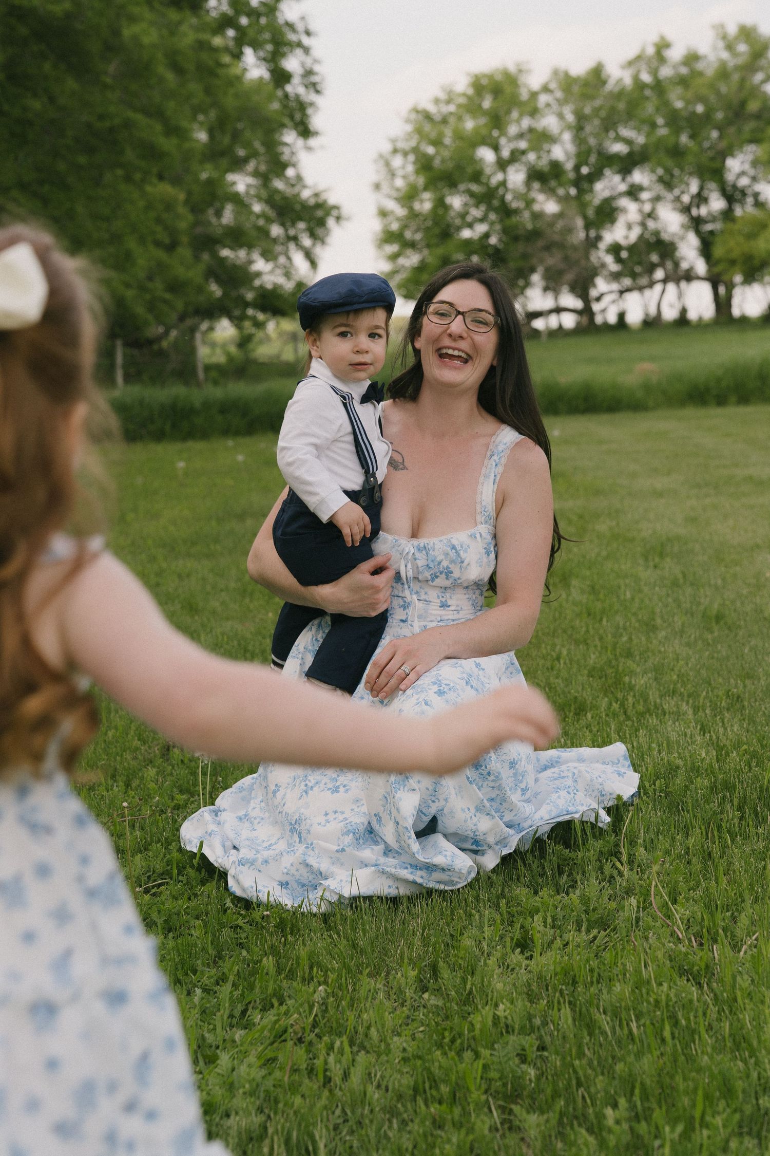 Signature motherhood portraits in Regina, Saskatchewan capturing authentic connection between mothers and their children.