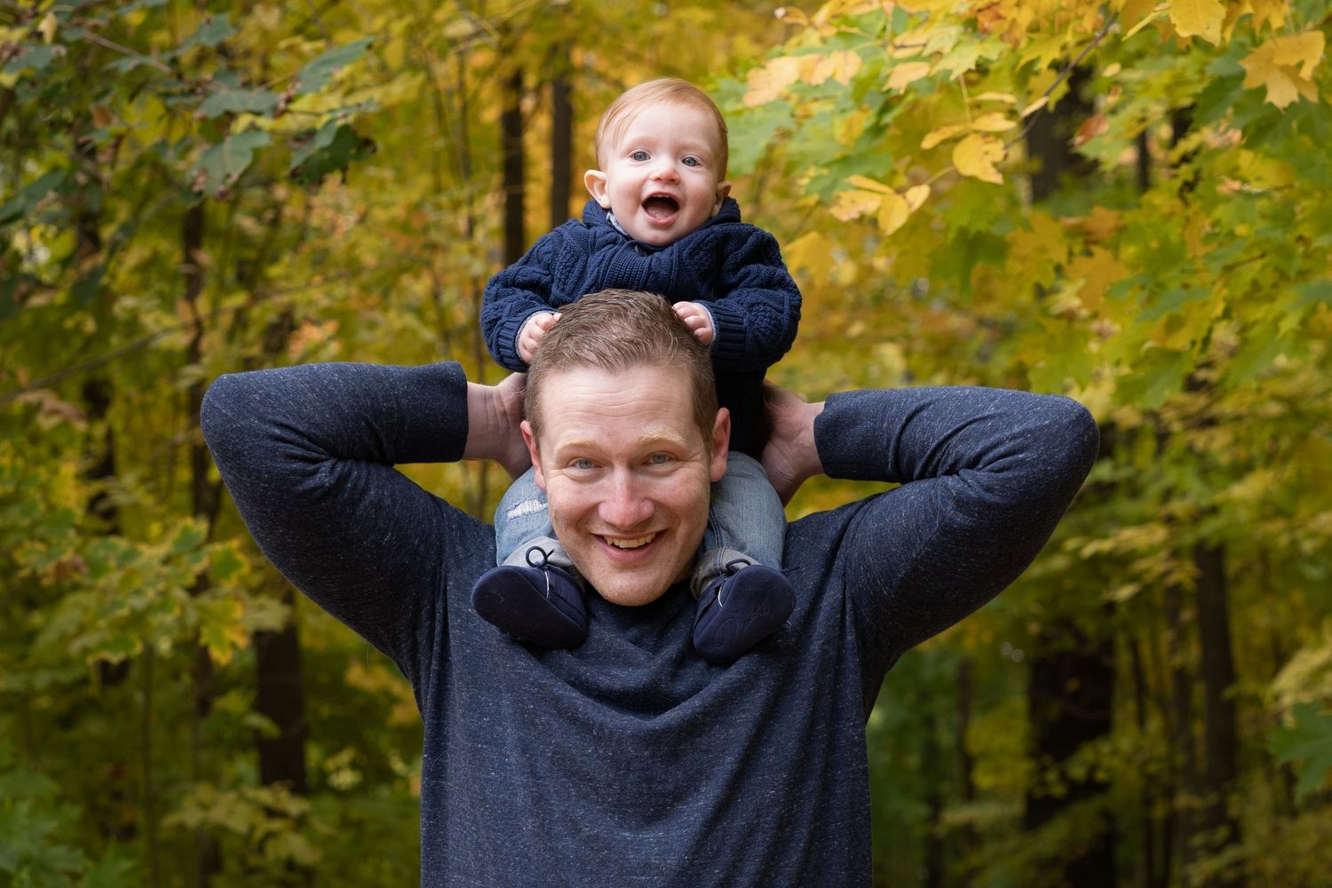 A series of candid expressions and poses captured outdoors against a backdrop of autumn foliage.