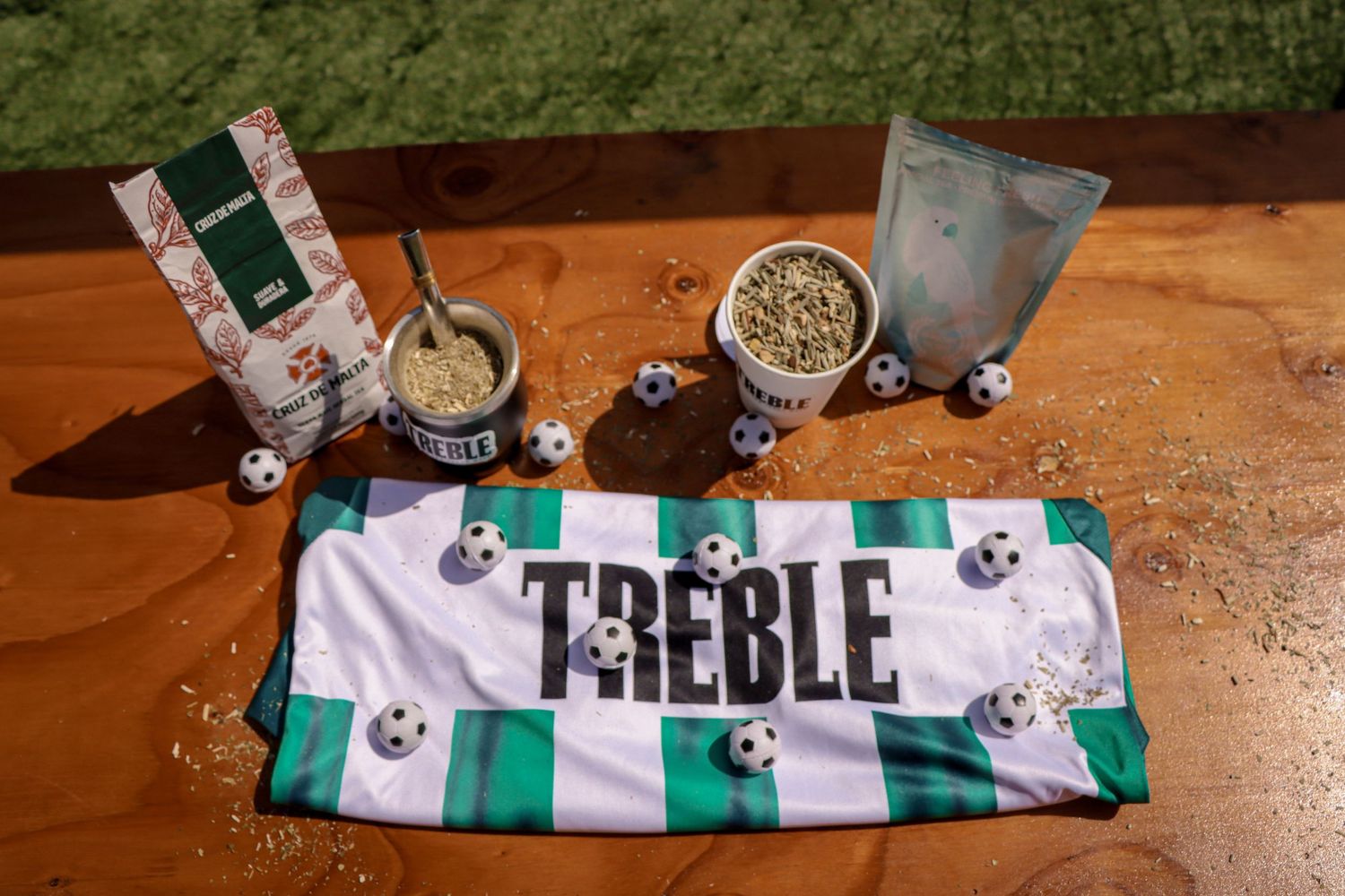 Soccer-themed party setup with green and white striped decor and Treble branding.
