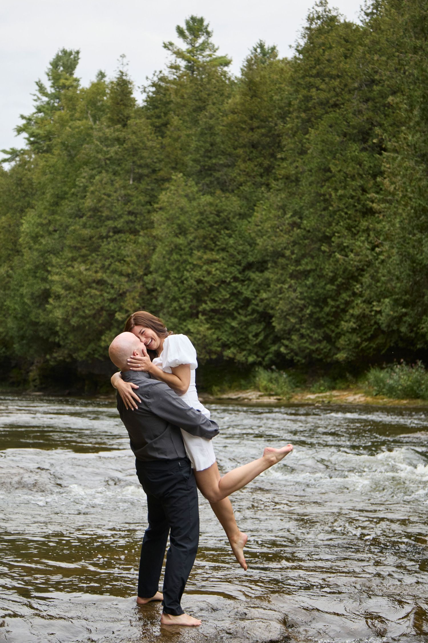 Bride and groom lift at Elora Gorge.