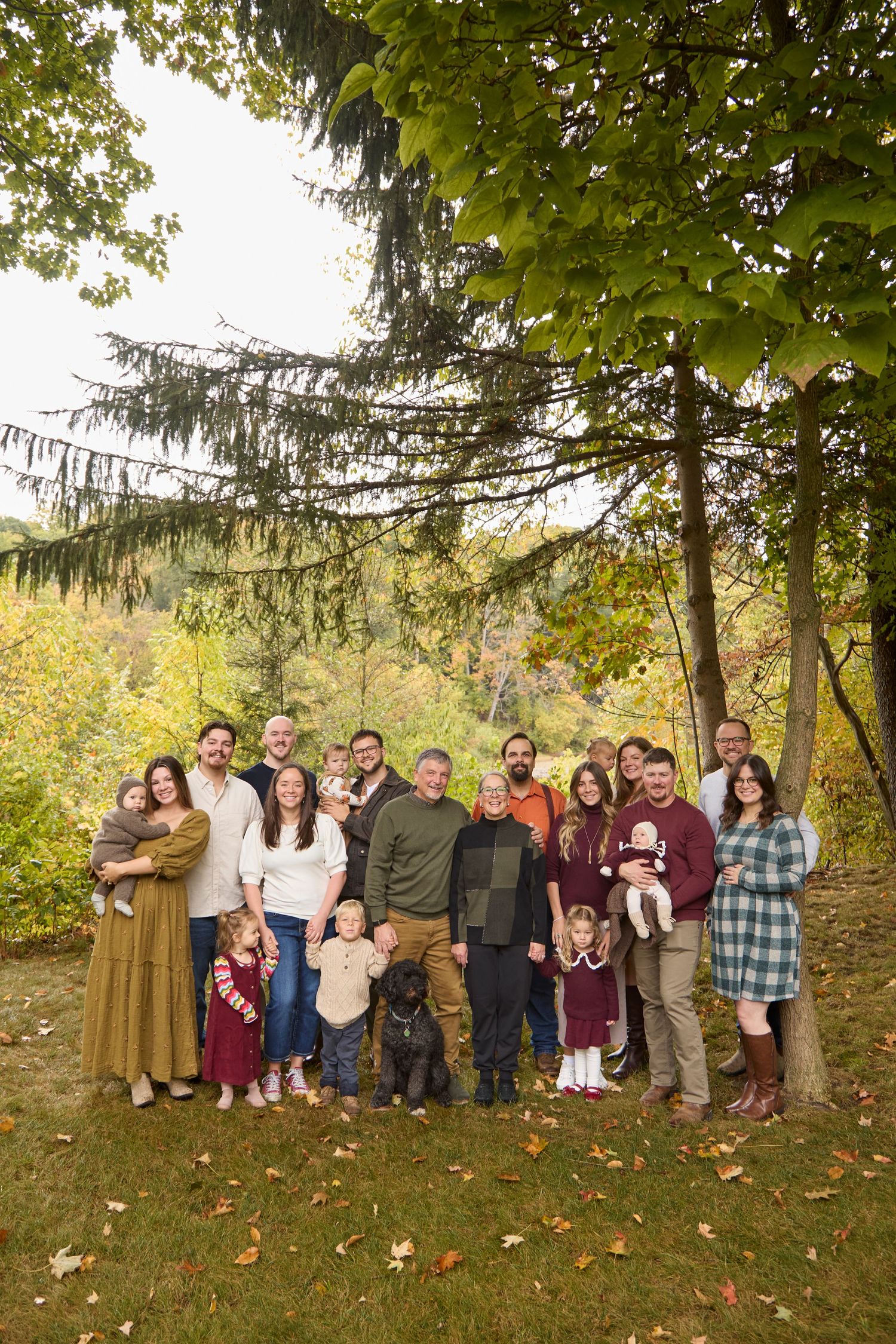 Extended family photo in fall setting.