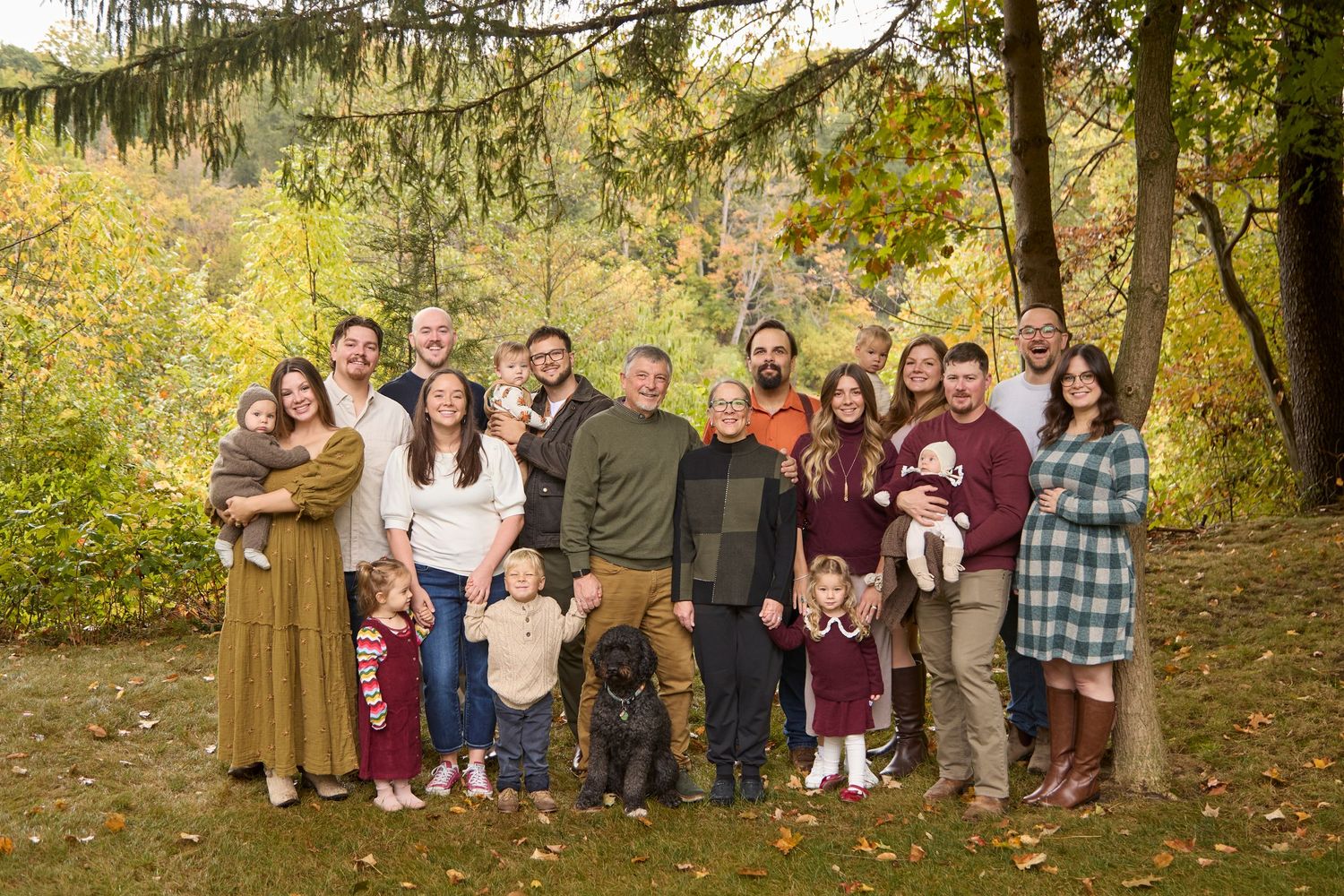 Extended family session of 4 families in fall setting.