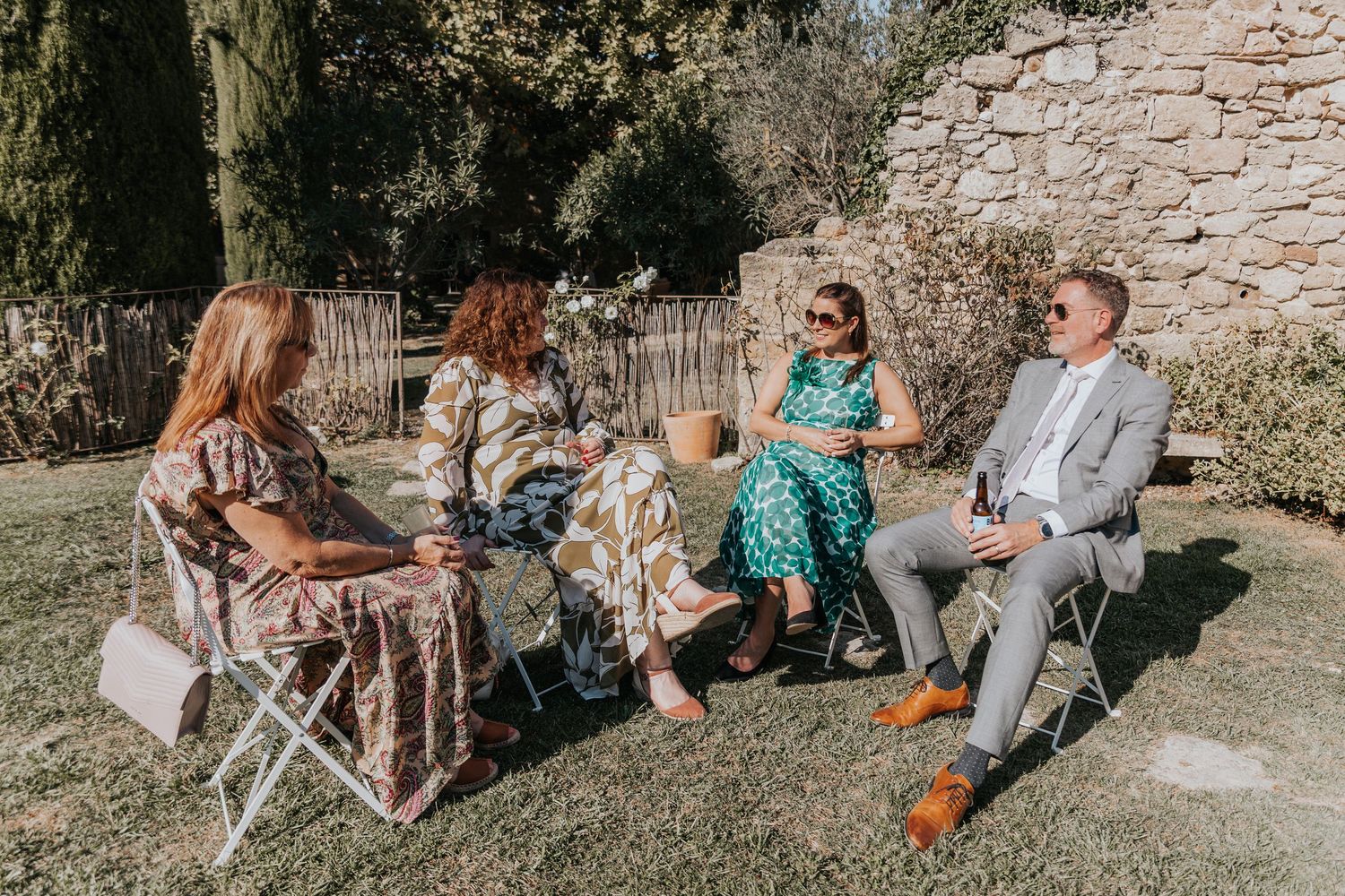 Guests chatting during canapés at Provence wedding venue