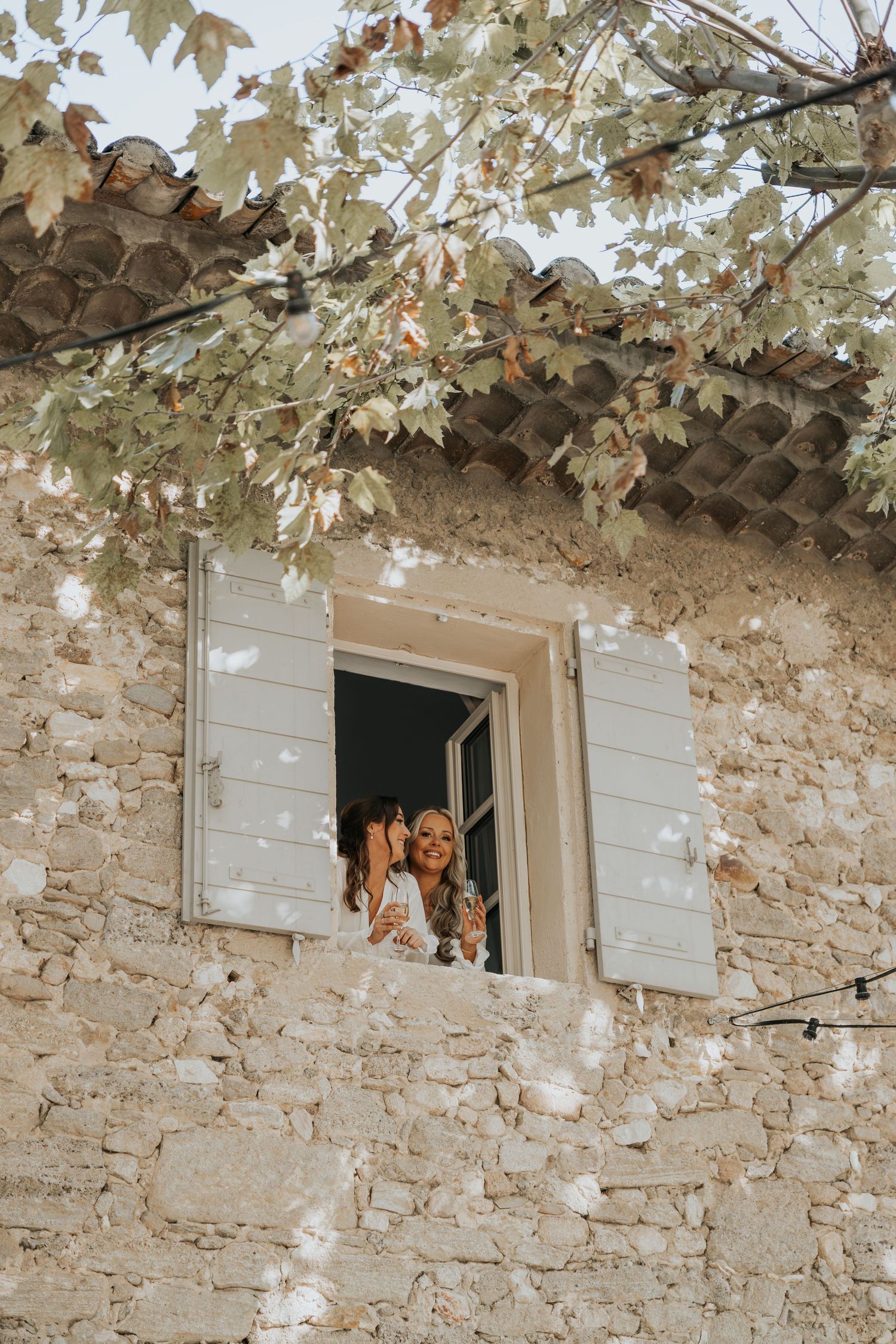 bridesmaid moment at Le Petit Roulet wedding in France captured in an editorial documentary style