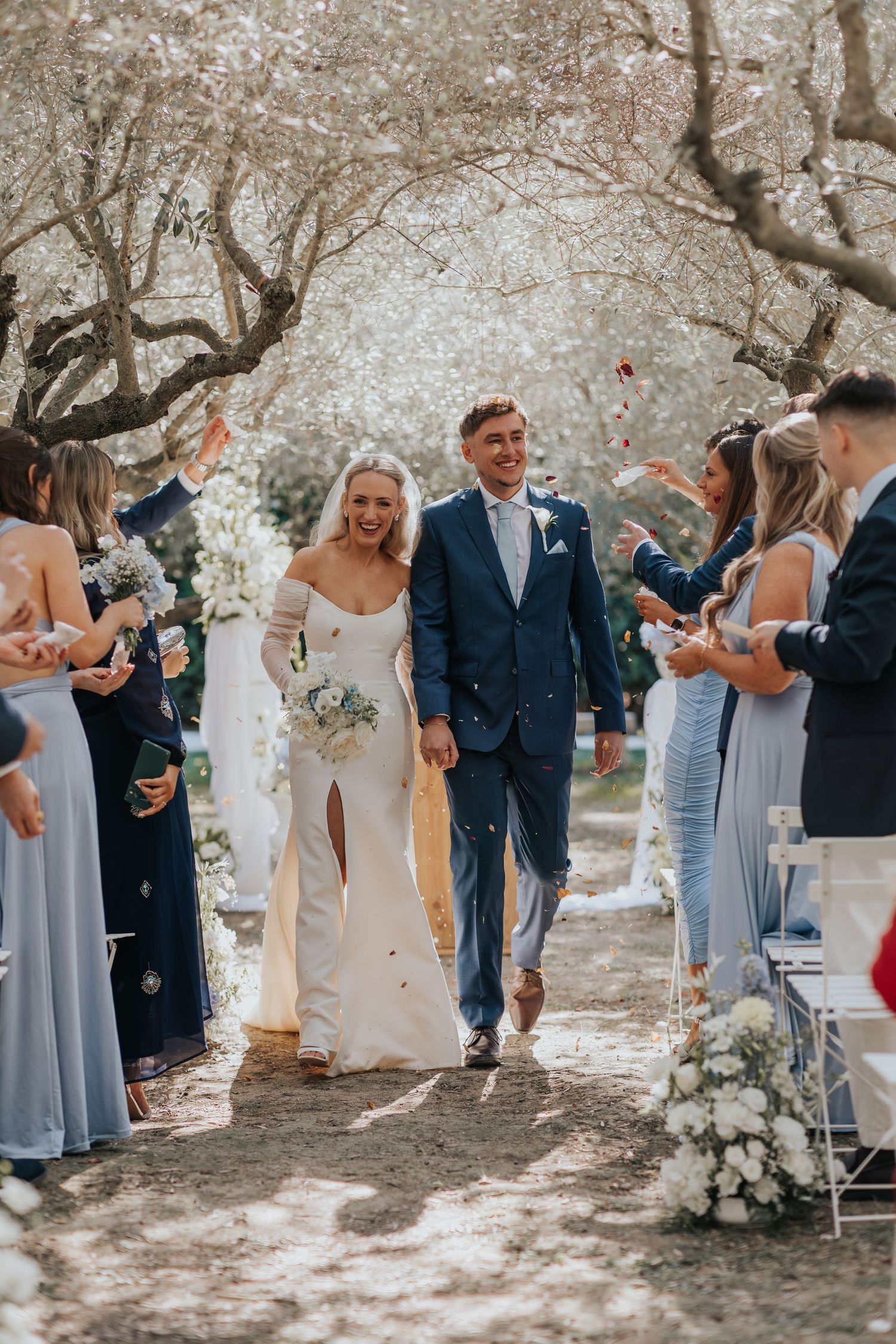 couple walking at Le Petit Roulet wedding venue in Provence