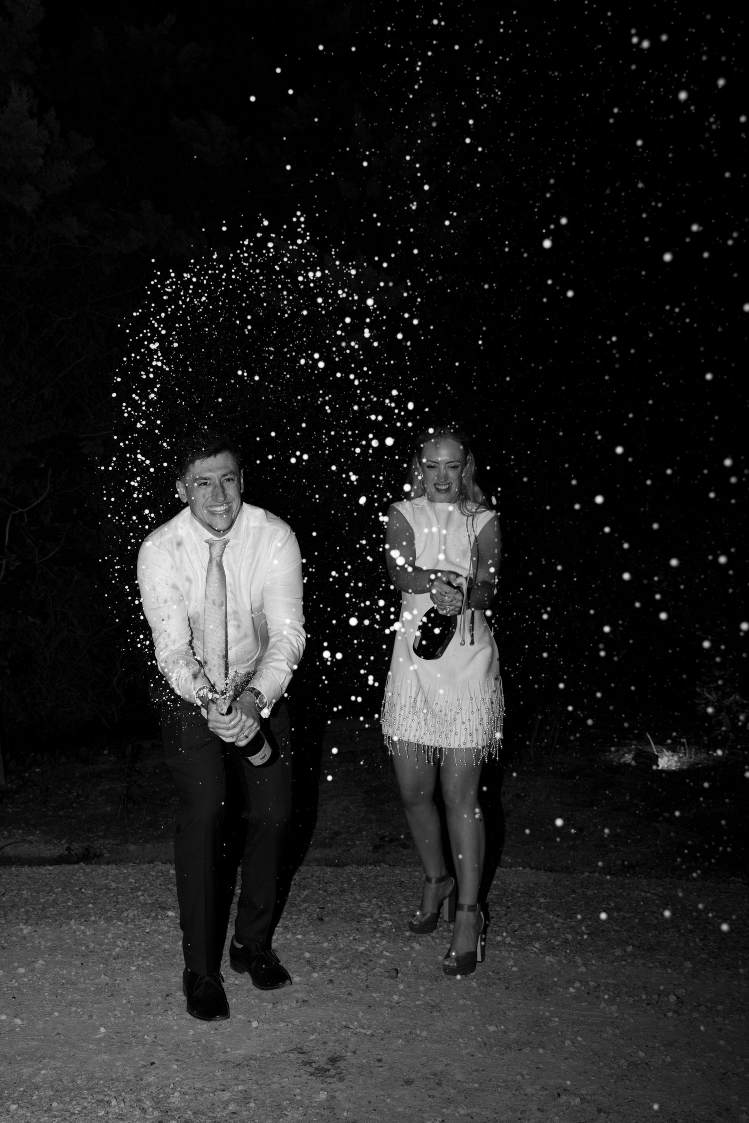 candid champagne spray at le petit roulet