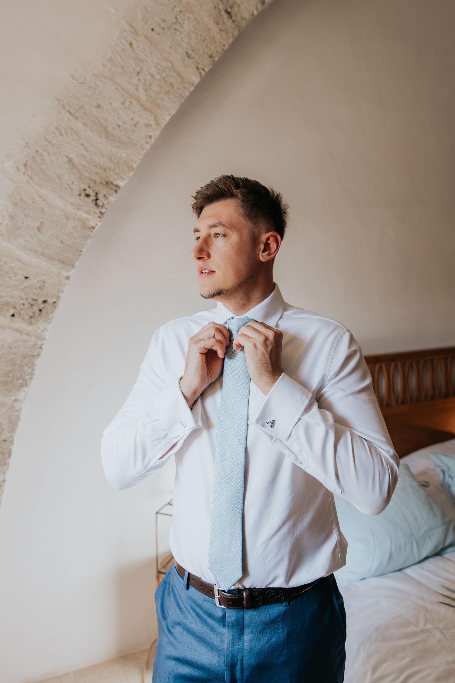 groom moment at Le Petit Roulet wedding in France captured in an editorial documentary style