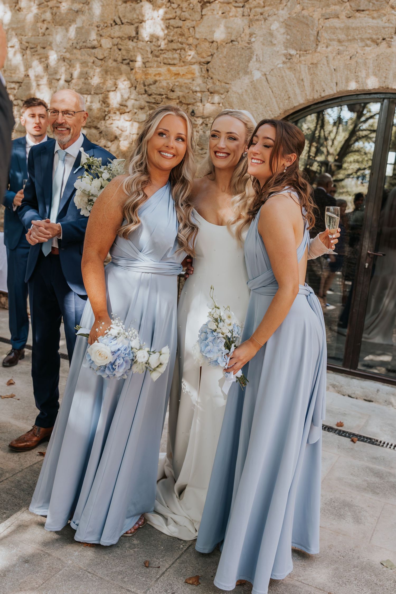 bridesmaids candid moment during destination wedding in France at Le Petit Roulet