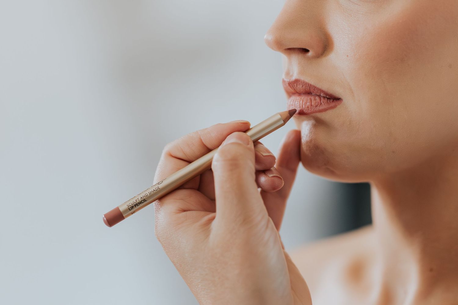 make up moment at Le Petit Roulet wedding in France captured in an editorial documentary style