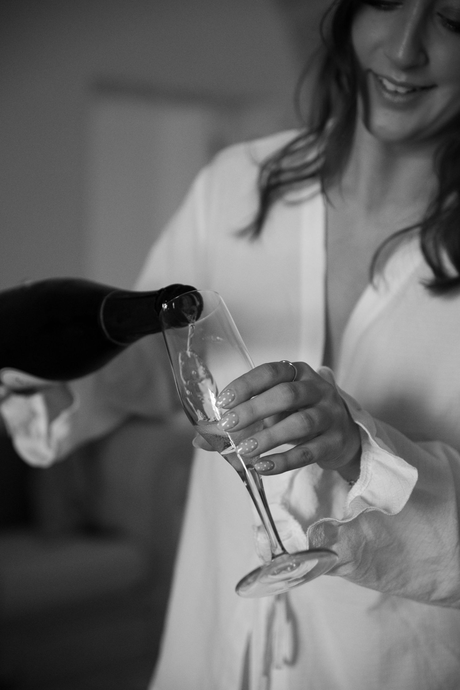 champagne moment at Le Petit Roulet wedding in France