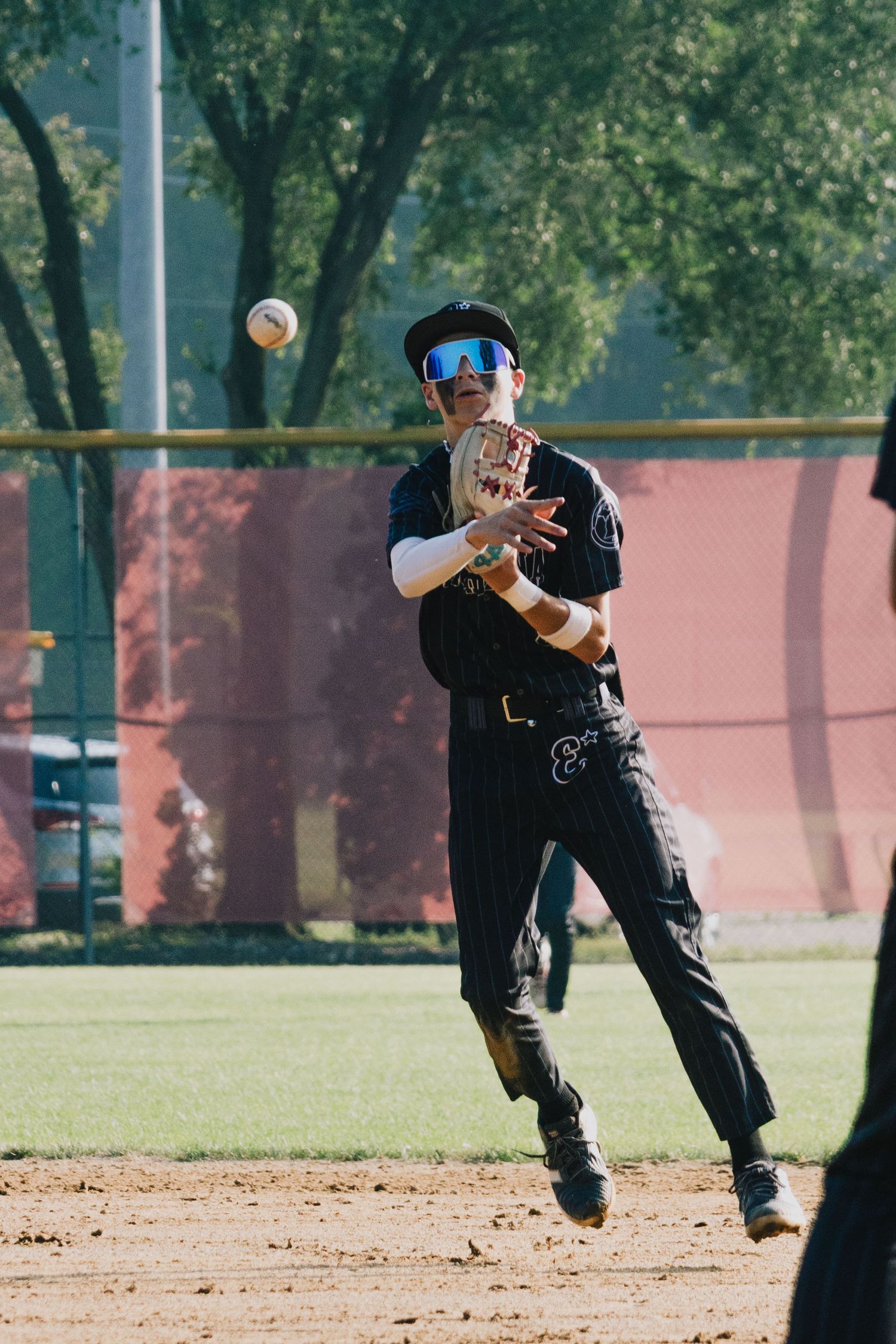 High school baseball photography by Legus Visuals serving South Bend, New Carlisle, LaPorte, and the Michiana area.
