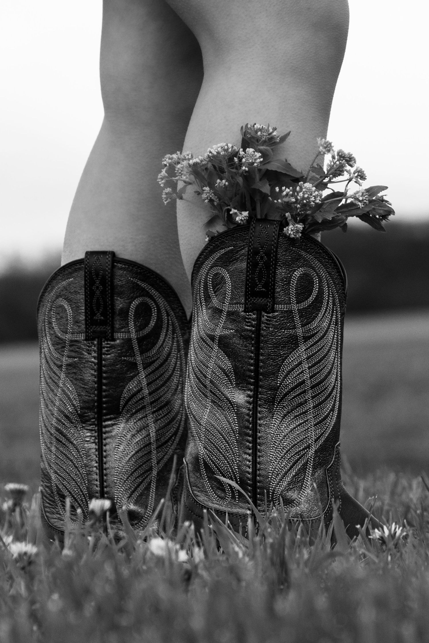 Rural portrait photography in Rolling Prairie, Indiana, featuring natural country scenery, cowgirl boots, and outdoor portraits.