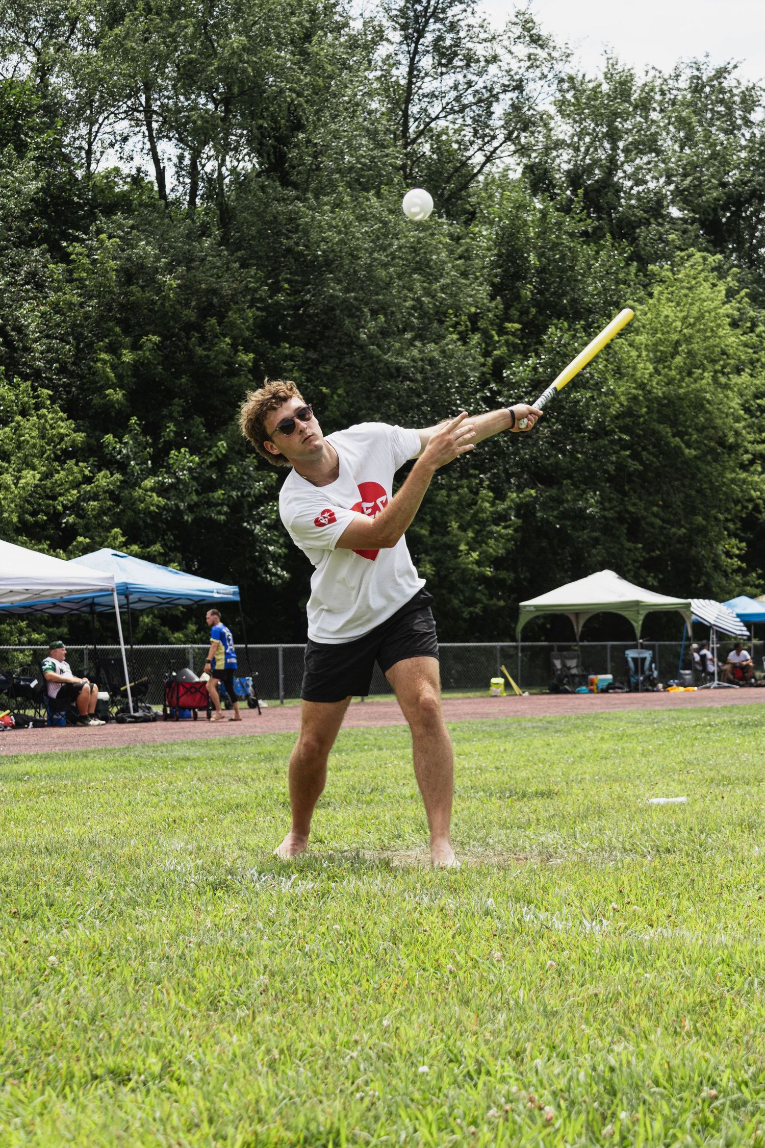 Wiffle ball photography by Legus Visuals featuring game action, players, and community events in New Carlisle, Indiana.