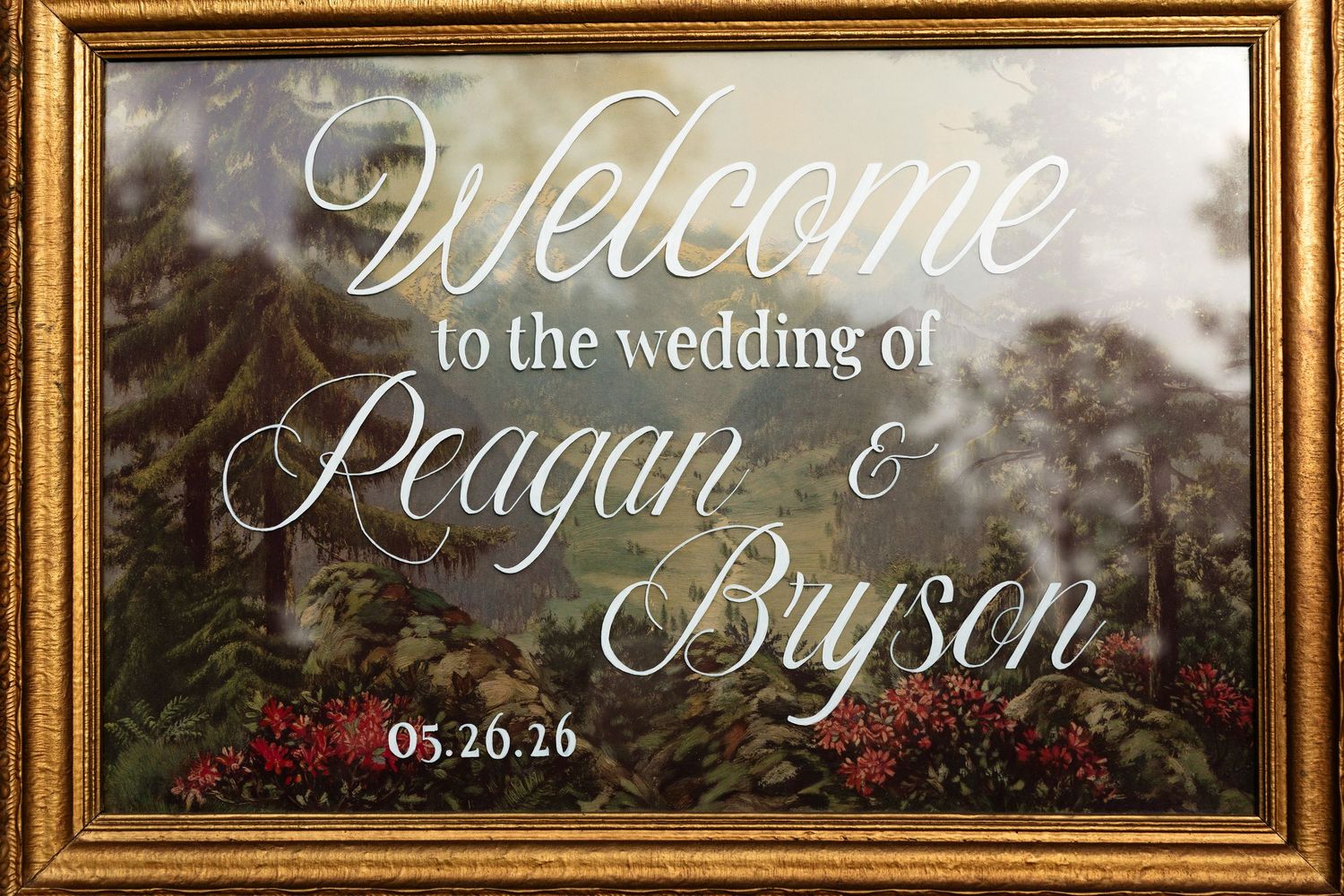 Gold framed wedding welcome sign for Reagan and Bryson's wedding on 05.20.16 with elegant script lettering.
