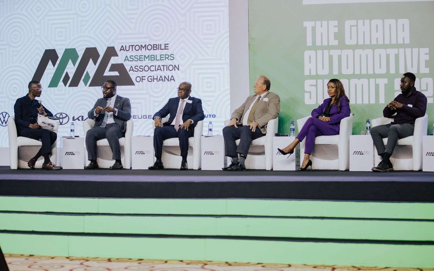 Six-person panel discussion at The Ghana Automotive Summit 2023 on stage.